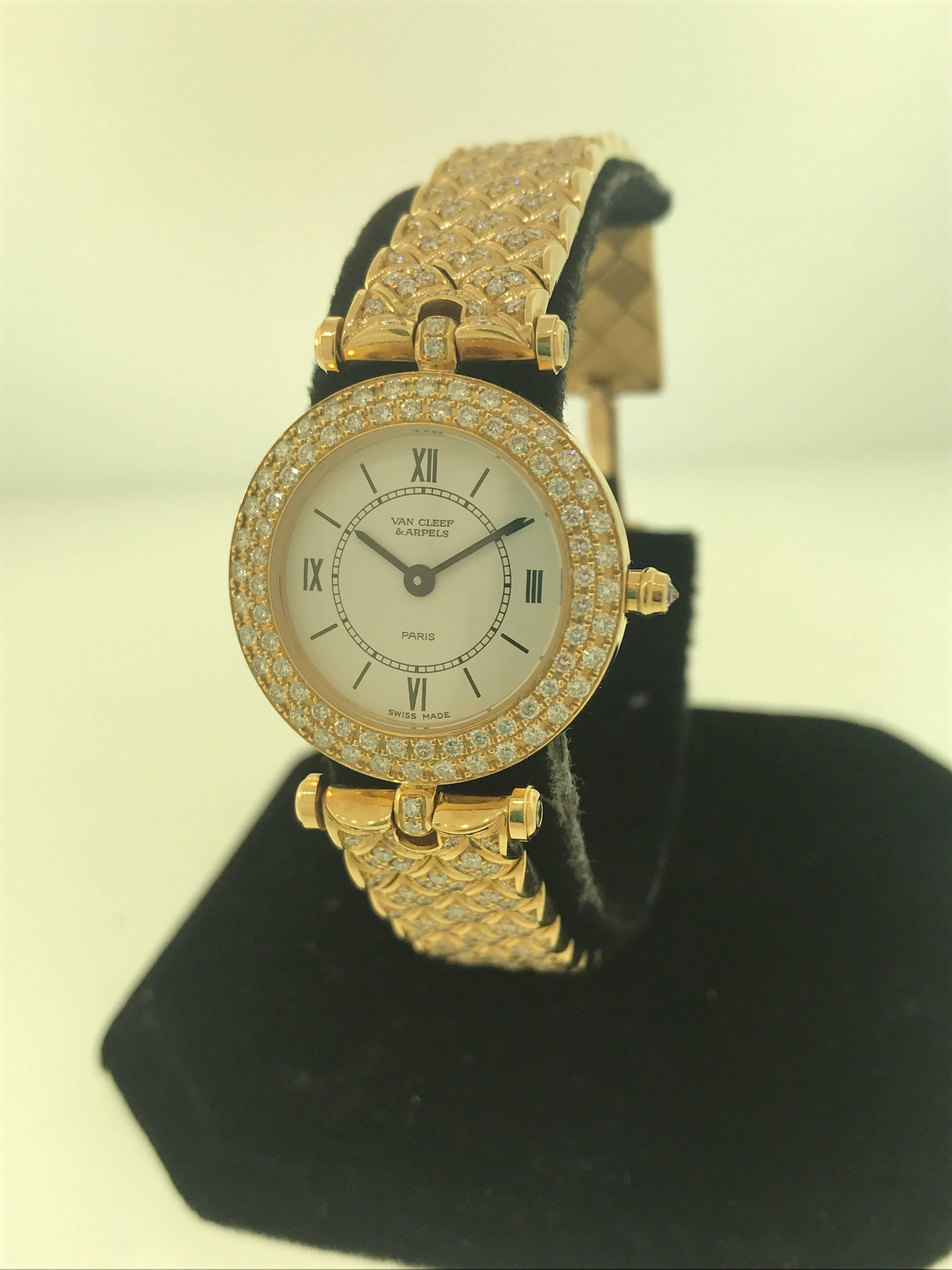 Van Cleef & Arpels Classique Ladies Watch

Model Number: 322632

100% Authentic

Pre owned restored to be in perfectly working & pristine condition

Comes with a generic watch box

18 Karat Yellow Gold Case & Bracelet

Bezel set with 2 rows of