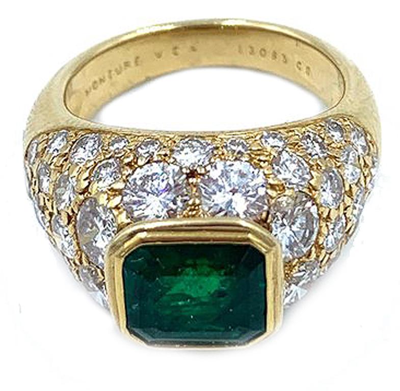 Very classy and elegant, this beautiful Emerald ring is created by the famed jewelry house of Van Cleef & Arpels. 
Center Emerald of 1.25 carats is mounted with 3.2 carats of diamonds. 

Size 4.5

Signed ” Monture VCA”  numbered 13063 cs