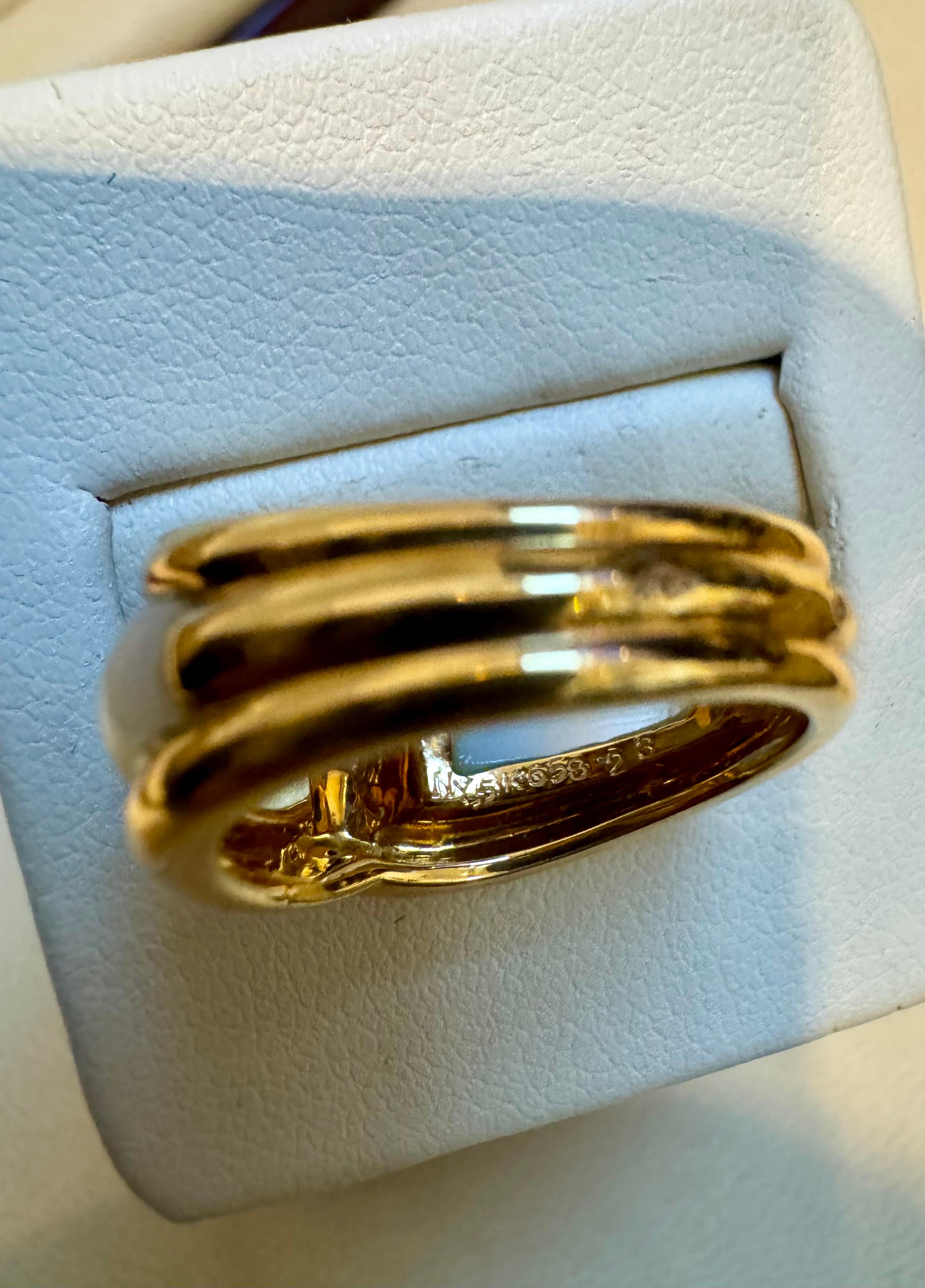 Van Cleef & Arpels Contemporary Mother of pearl “Twisted” Ring 18KY Gold Size5.5 In Excellent Condition For Sale In New York, NY
