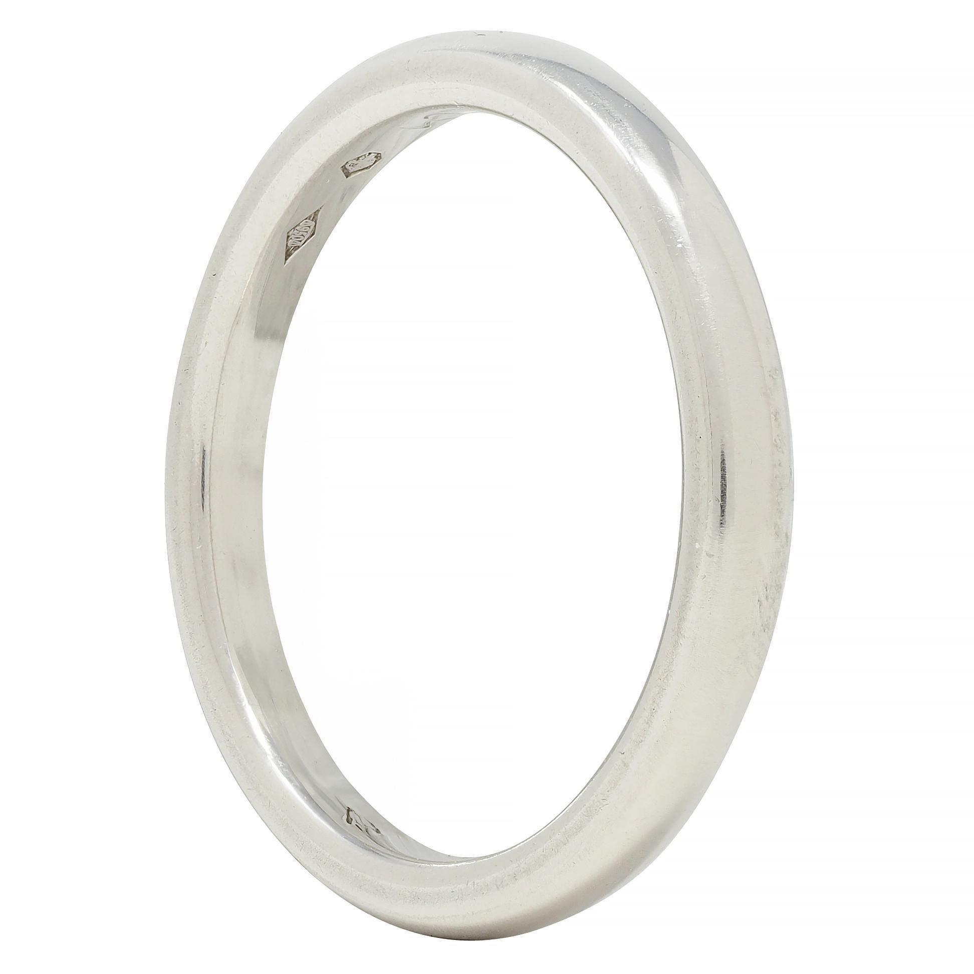 Designed as a curved platinum band
With high polish finish
Stamped with Swiss hallmarks for platinum
Numbered and signed for Van Cleef & Arpels
Circa: 2000s
Ring size: 6 1/2
Measures north to south 2.5 mm and sits 2.0 mm high
Total weight: 5.1 grams