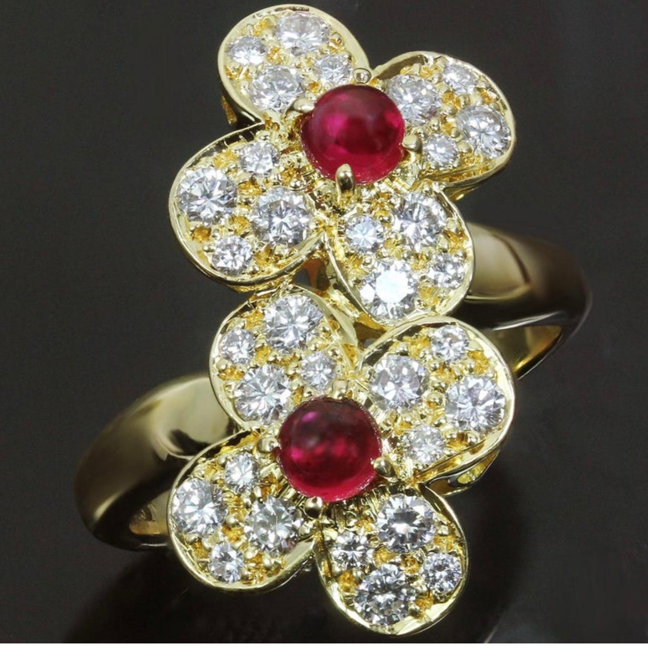 VAN CLEEF & ARPELS
Created by Van Cleef & Arpels, this “Trefle” ring is composed of cabochon rubies and diamonds. The bypass form ring is designed as two pave-set diamond blossoms, each centering a cabochon ruby. This unusual twin-flower Trefle ring
