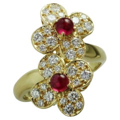 Vintage Van Cleef & Arpels Contemporary Ruby and Diamond “Trefle” Ring, 18KY Gold Size 6