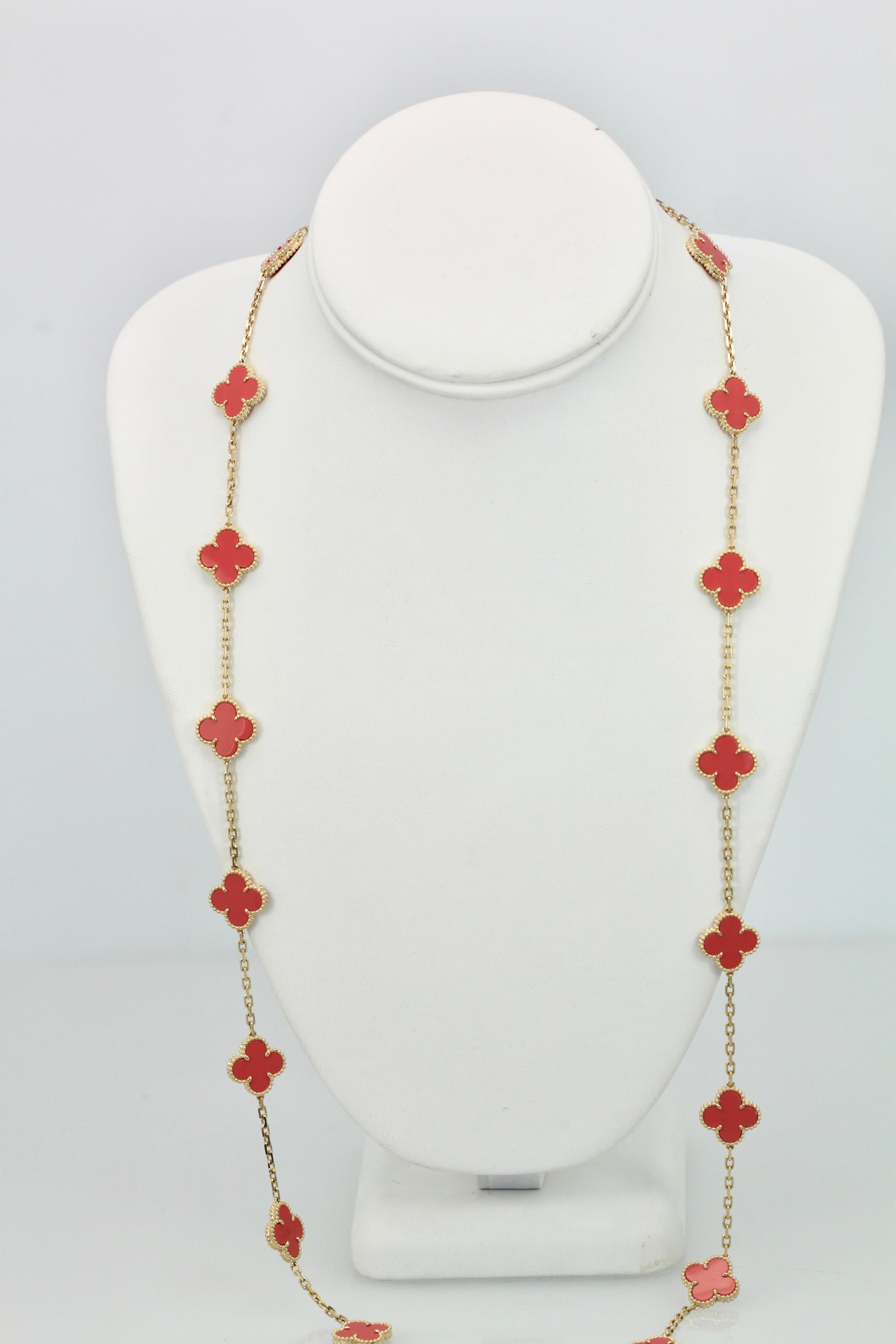 This gorgeous Coral Alhambra is the 20 motif necklace in 18K Yellow Gold and it is stunning.  This Coral Alhambra is rare as Coral is extinct and these are no longer made.  This piece was made in 1981 and authenticated by Van Cleef in 2015.  It is