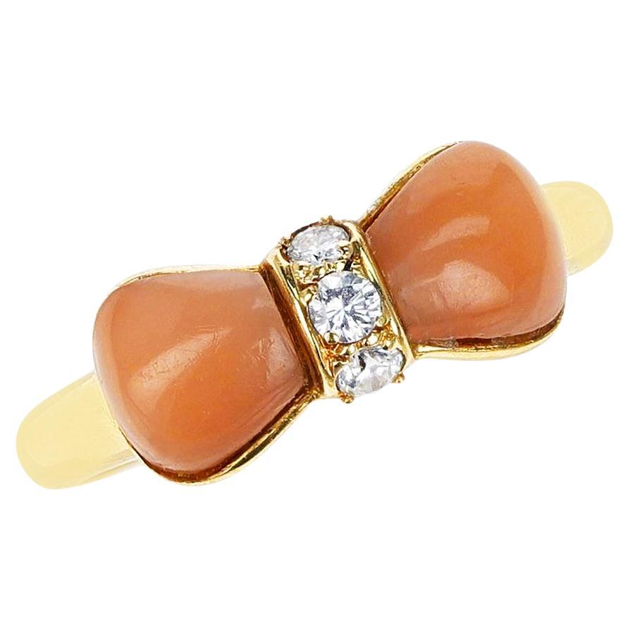 Van Cleef & Arpels Coral and Diamond Bow Ring, 18k