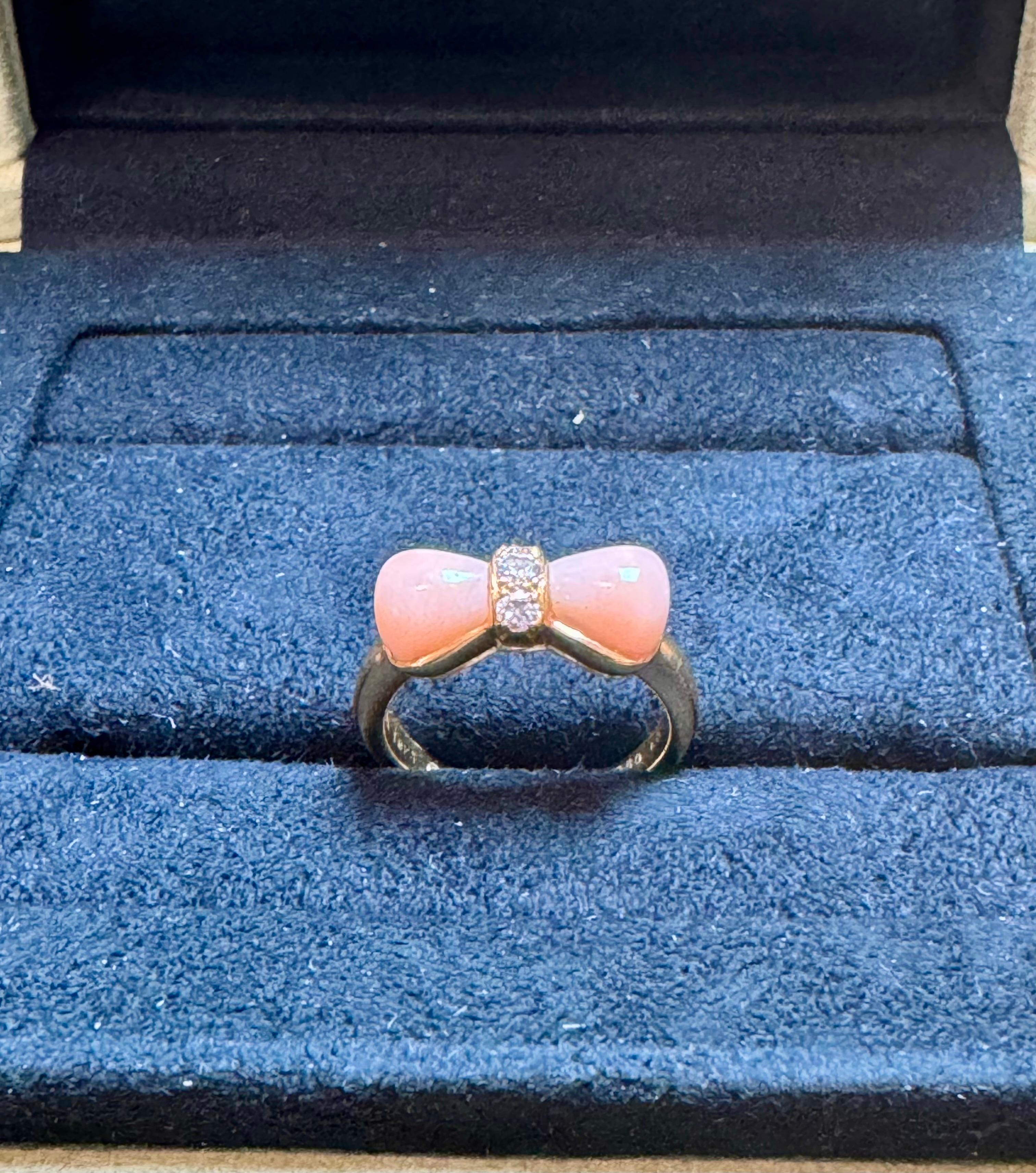 VAN CLEEF & ARPELS
A Van Cleef & Arpels Coral Bow and Diamond Ring made in 18 Karat Yellow Gold. The total weight of the ring is 4.5 grams. 
The ring size is US 4.5
This lovely authentic ring is crafted from 18k yellow gold with a polished finish.
