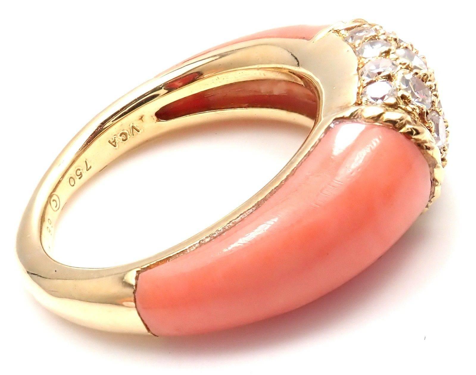18k Yellow Gold Diamond & Coral Band Ring by Van Cleef & Arpels. 
With 18 round brilliant cut diamond VS1 clarity, G color total weight .50ct
Onyx. And 2 beautiful coral stones 14mm x 7mm.
Details: 
Ring Size: 5 (resize available) 
Weight: 6.2