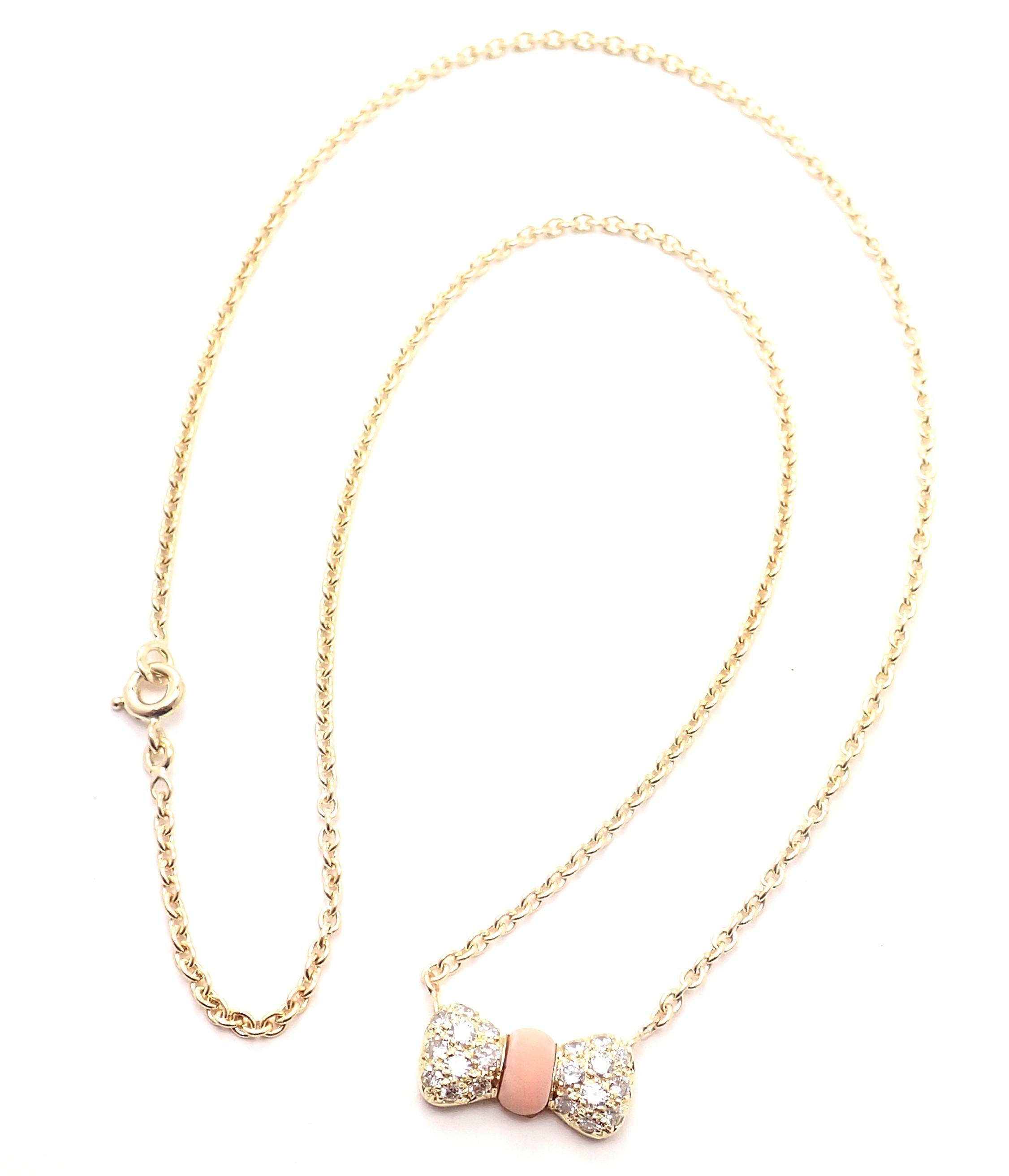 18k Yellow Gold Diamond Coral Bow Necklace by Van Cleef & Arpels. 
With 20 diamond VVS1 clarity, G color total weight .10ct 
Details: 
Necklace Length: 15.5''
Pendant: 15mm x 8 mm
Weight: 5.3 grams
Stamped Hallmarks: VCA 18k 83 B4342K169
*Free