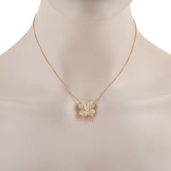 Van Cleef & Arpels Cosmos: 18 Karat Gelbgold Blumenbrosche/Anhänger mit 1,84 Karat Diamant