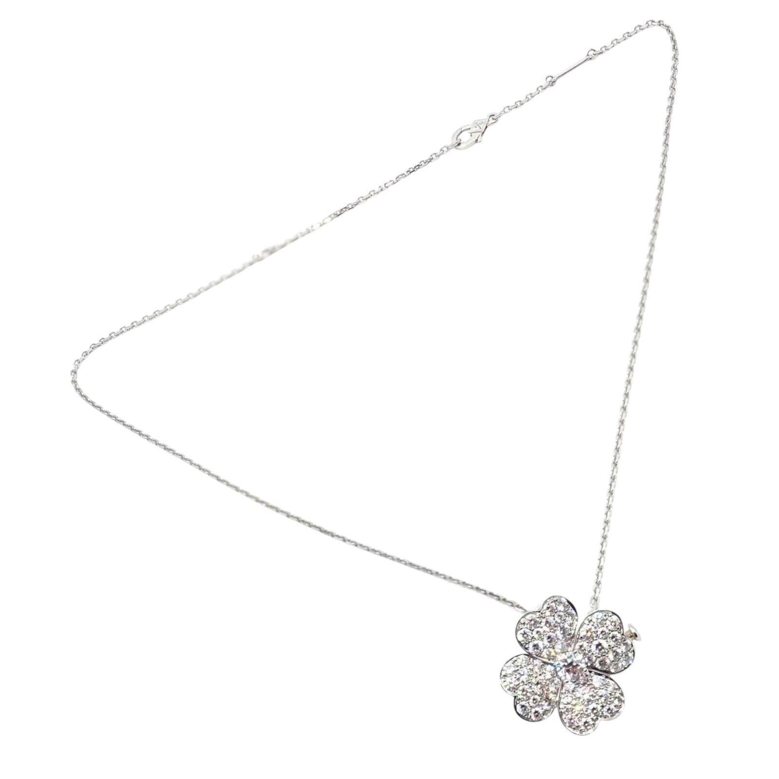 18k White Gold Diamond Cosmos Medium Size Brooch Pendant Necklace by Van Cleef & Arpels.
The Van Cleef & Arpels Cosmos 18k White Gold Diamond Medium Brooch Pendant Necklace exudes timeless elegance. 
Expertly crafted in gleaming white gold, its