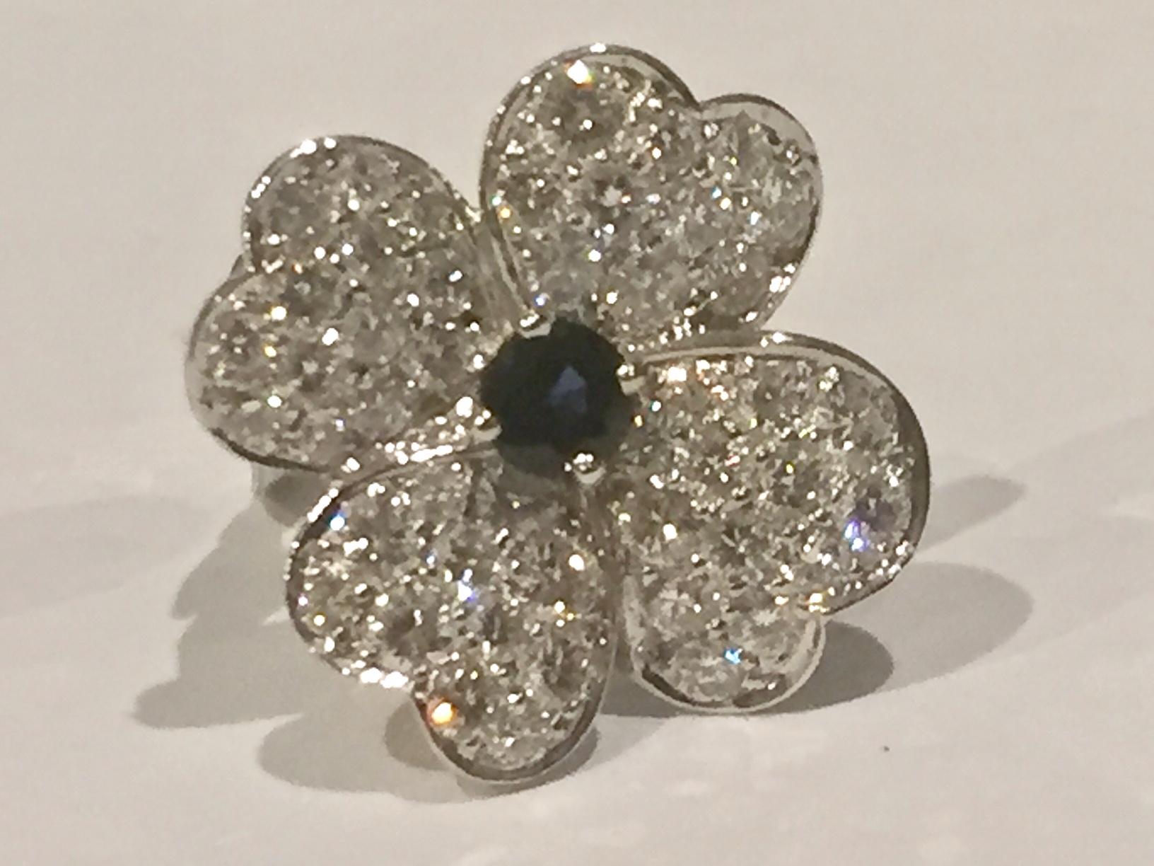 Contemporary Van Cleef & Arpels Cosmos Gold Sapphire Diamond Flower Earrings