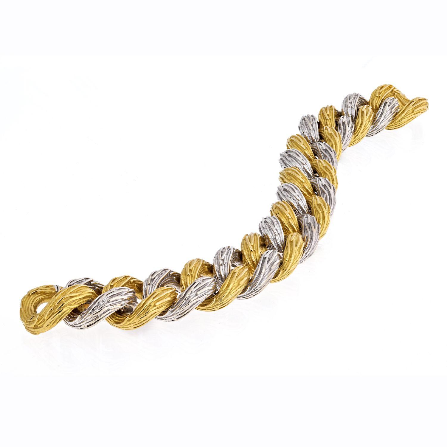 Vintage Signed Van Cleef & Arpels 18 Karat White and Yellow Gold Link Bracelet.

This is a unisex two tone gold bracelet that is suitable for both men and women. It is designed with Thick Curb Link Gold chunky links and is 8 inches long. The links