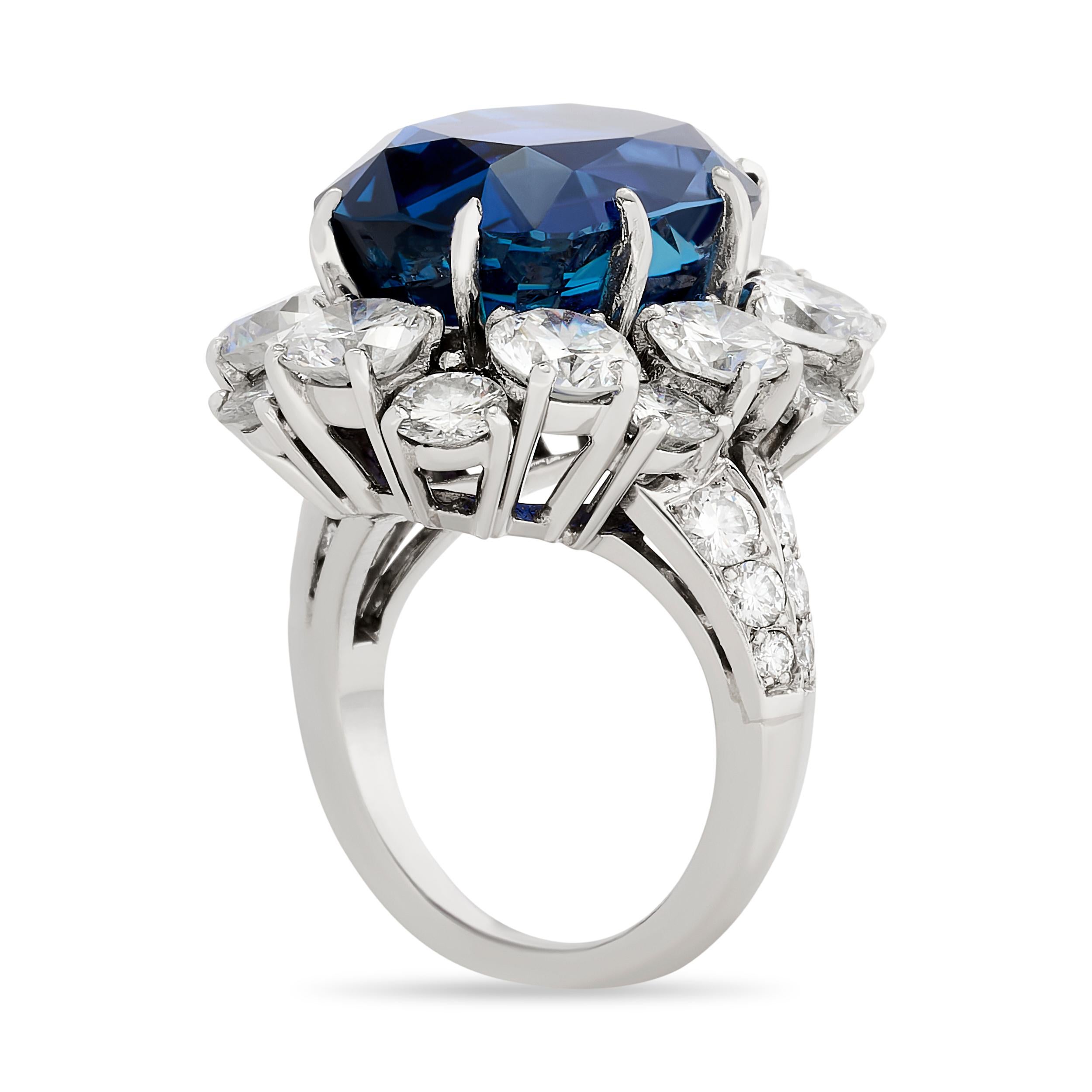 Captivating elegance meets timeless beauty in this Van Cleef & Arpels sapphire and diamond halo ring, a dazzling embrace of color and brilliance, capturing hearts one exquisite detail at a time.

The cushion sapphire weighs approximately 15.89