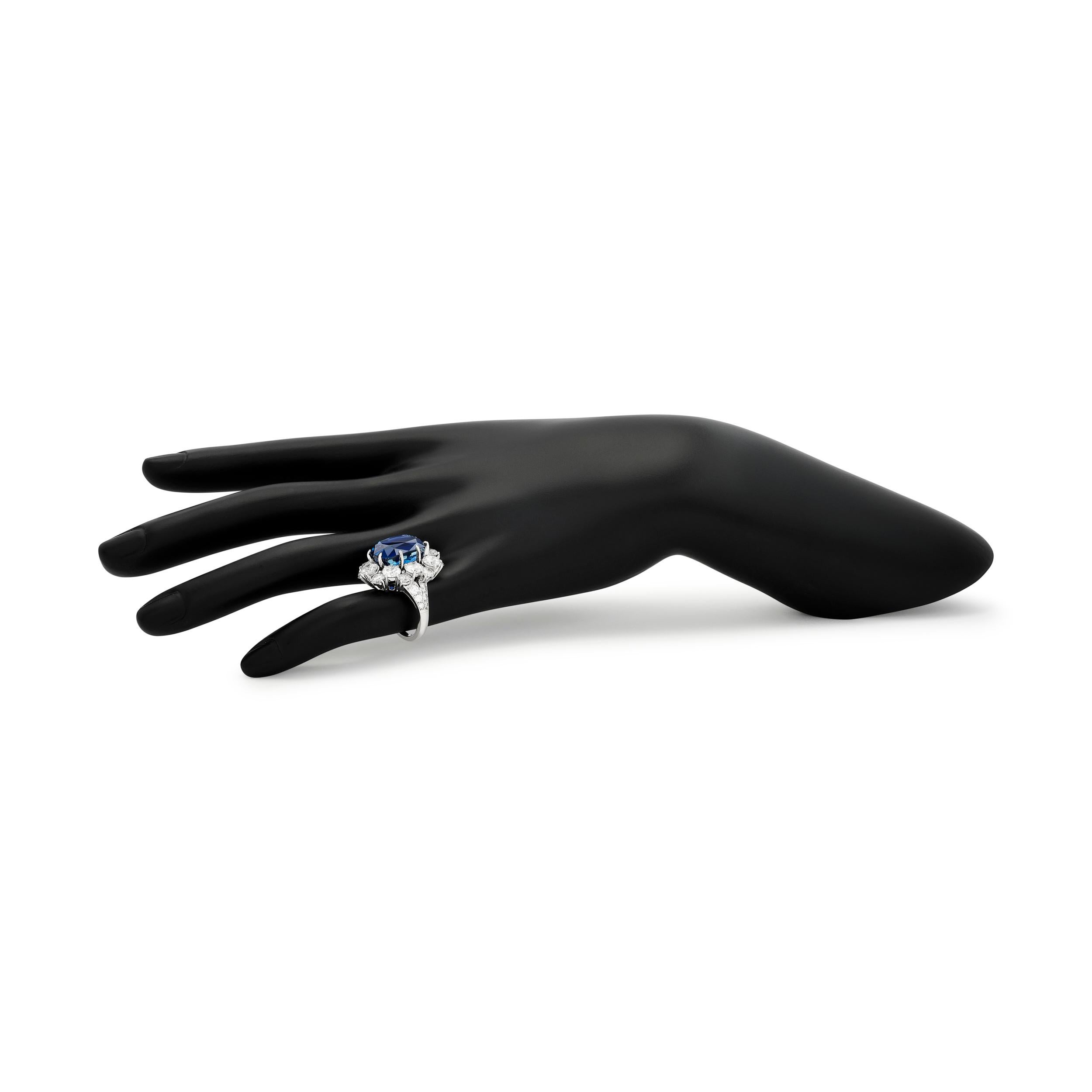 Van Cleef & Arpels Cushion Sapphire and Diamond Halo Ring in Platinum In Excellent Condition For Sale In Philadelphia, PA
