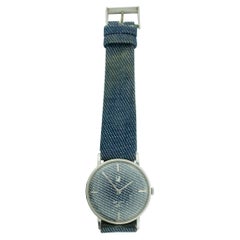 Van Cleef & Arpels Montre Denim en acier inoxydable avec 3 bracelets et pochettes supplémentaires