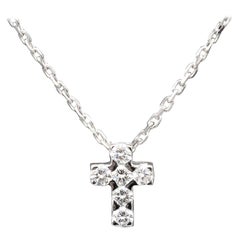 Van Cleef & Arpels, collier pendentif croix en or blanc 18 carats et diamants