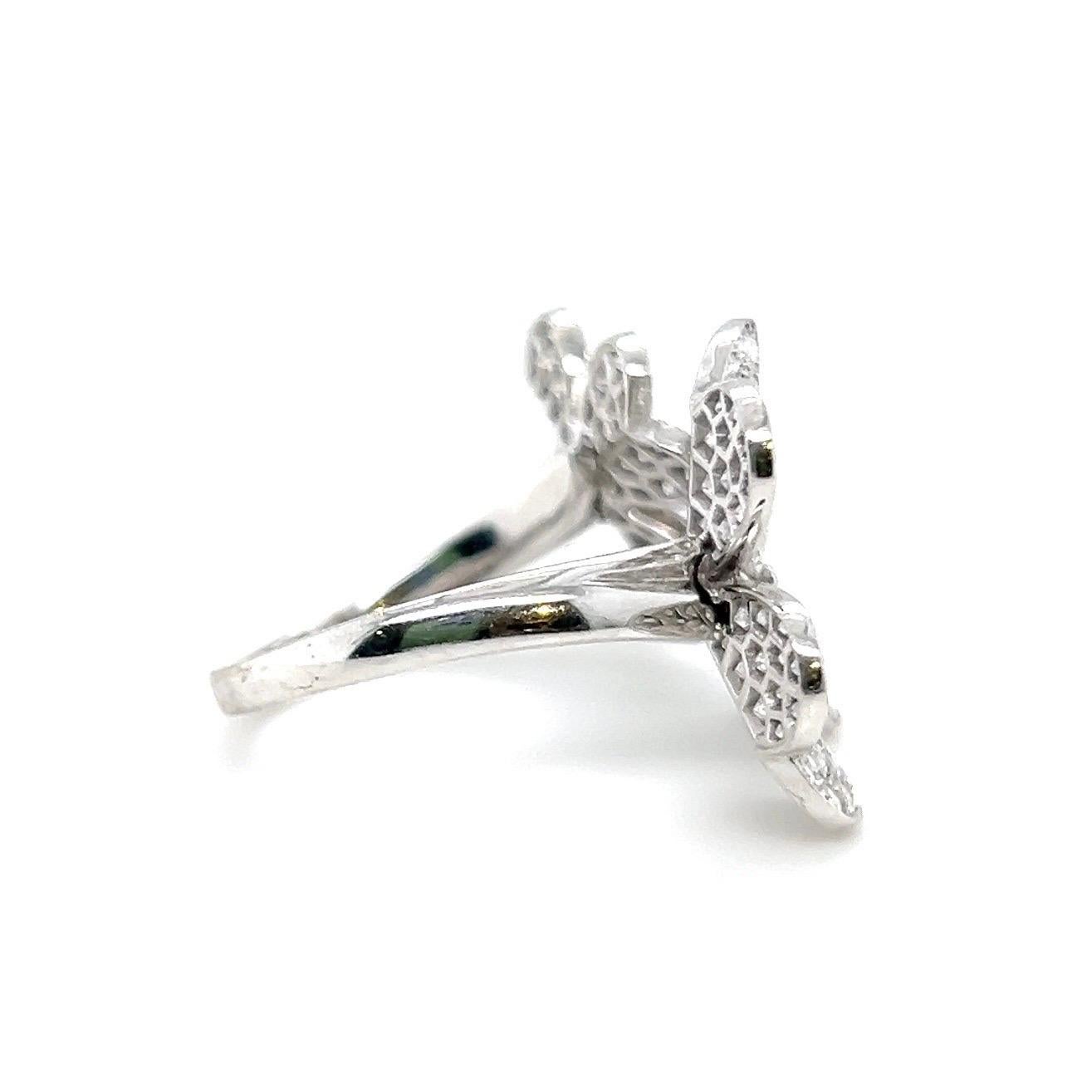 Contemporary Van Cleef & Arpels Diamond and 18 Karat White Gold Frivole Ring For Sale