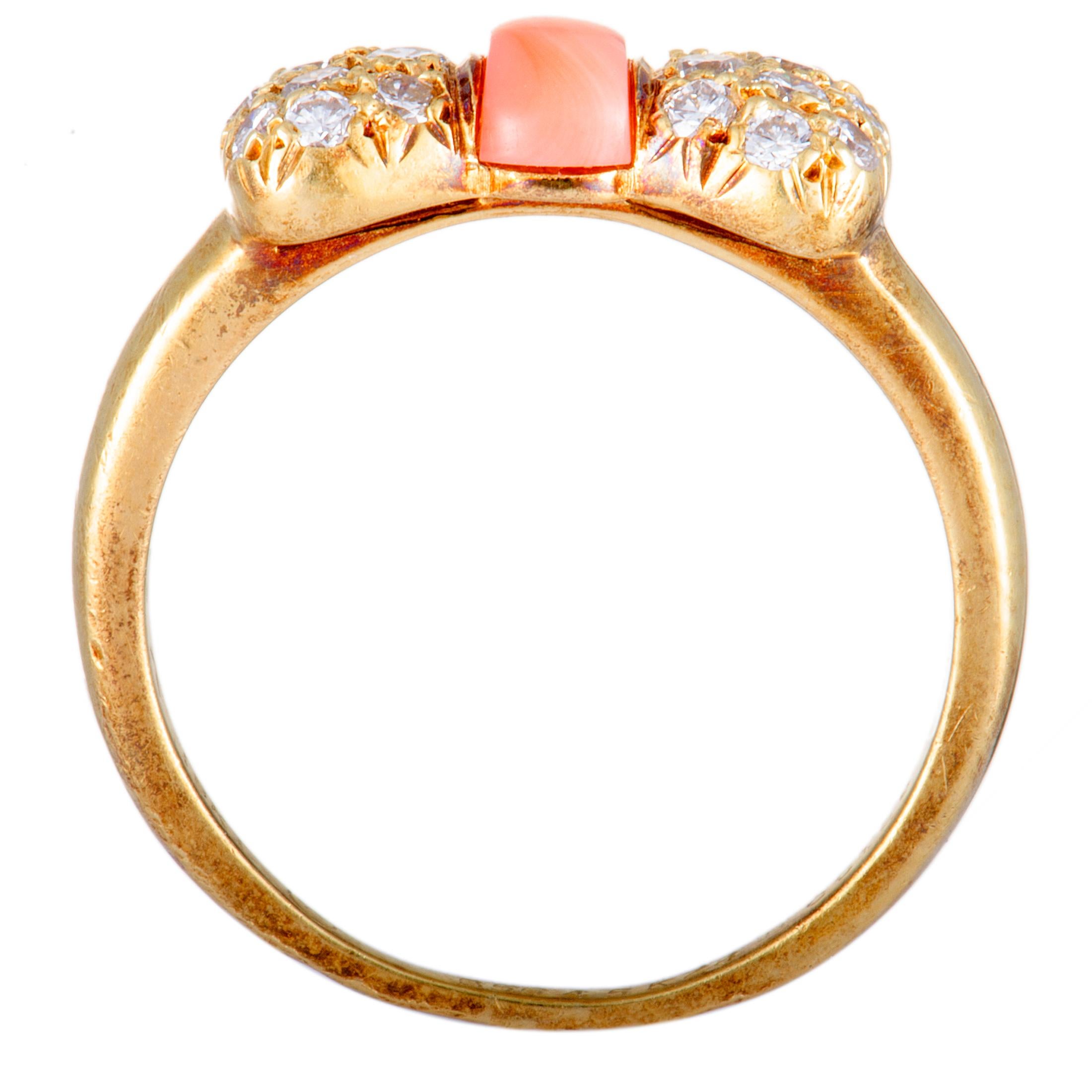 Designed in an exceptionally charming manner, this gorgeous vintage ring from Van Cleef & Arpels boasts a compellingly feminine appeal. The ring is beautifully made of 18K yellow gold and embellished with a sublime coral and with dazzling diamonds