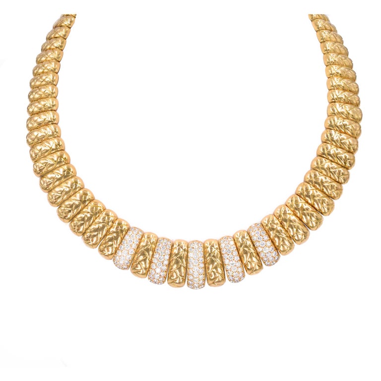 Van Cleef & Arpels, 18k gold and diamond necklace, The necklace composed of gold
links with braided design, encrusted at the front within quality round brilliant-cut diamonds, estimated total diamond weight is 4.20 carats
 Signed: VCA &  numbered