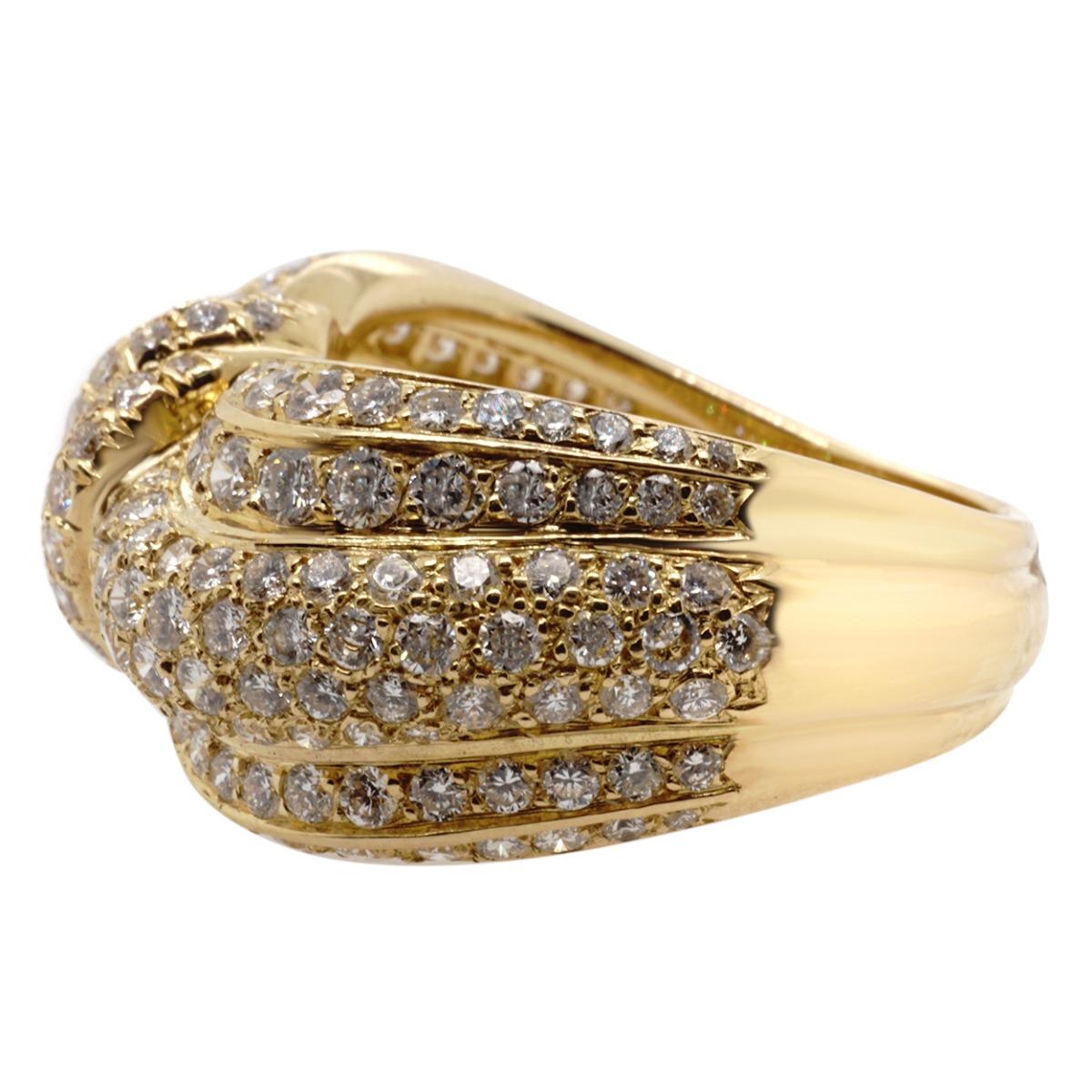 Crafted in 18 karat yellow gold from Van Cleef & Arpels France featuring round diamonds.  Signed VCA France 750 18k with hallmarks and maker mark.   Ring size 9 1/2.  Weighs 13.5 gr./8.7 dwt.  Ring 12.5 in width.  

Diamonds:  Weight estimated 3.00