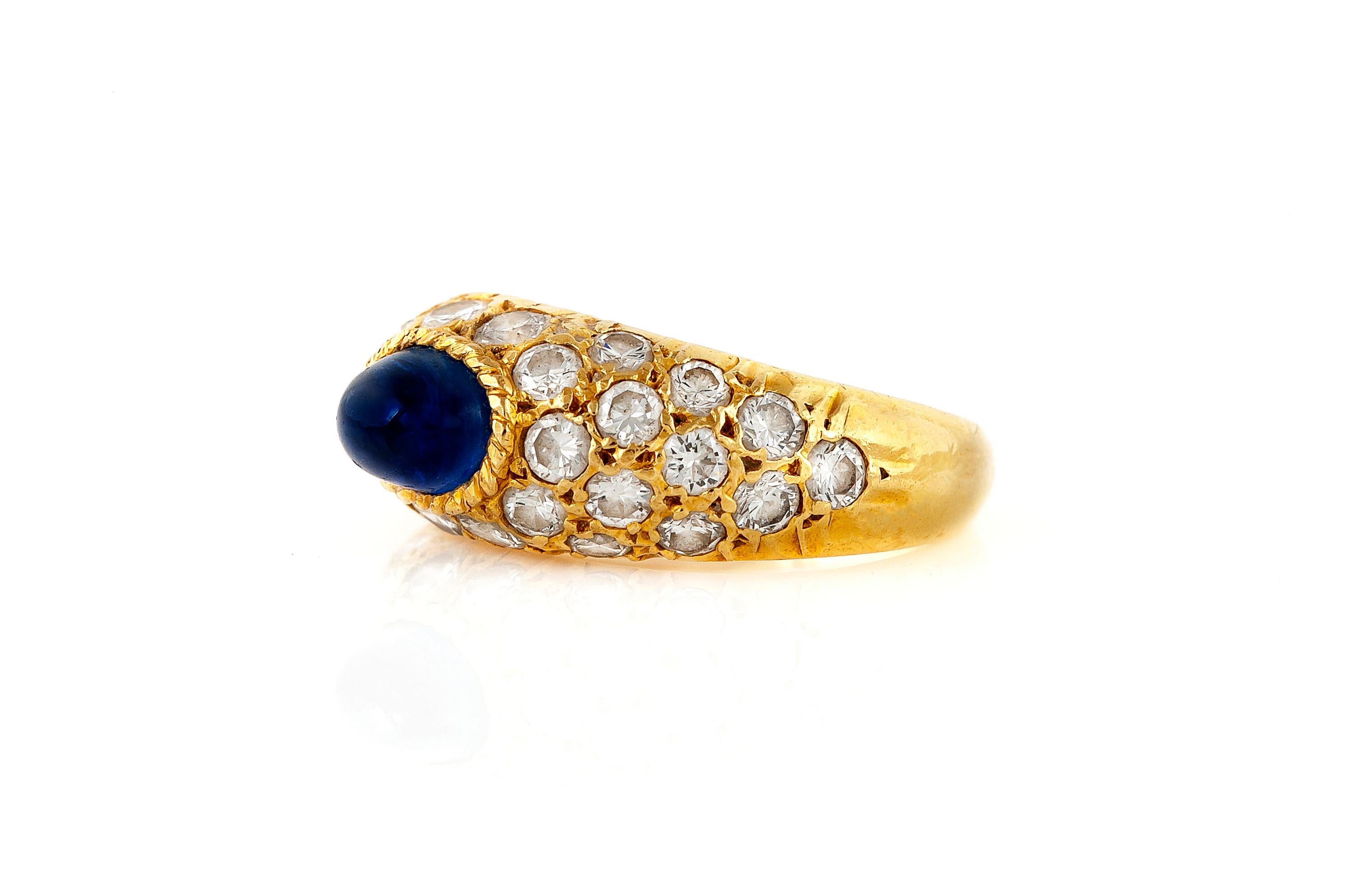 Finely crafted in 18k yellow gold with a Cabochon Sapphire and Round Brilliant cut Diamonds.
Signed by Van Cleef & Arpels.
Circa 1980s
Size 3 1/2