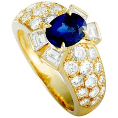 Van Cleef
Arpels Diamond and Sapphire Yellow Gold Band Ring Van Cleef
Arpels Diamond and Sapphire Yellow Gold Band Ring