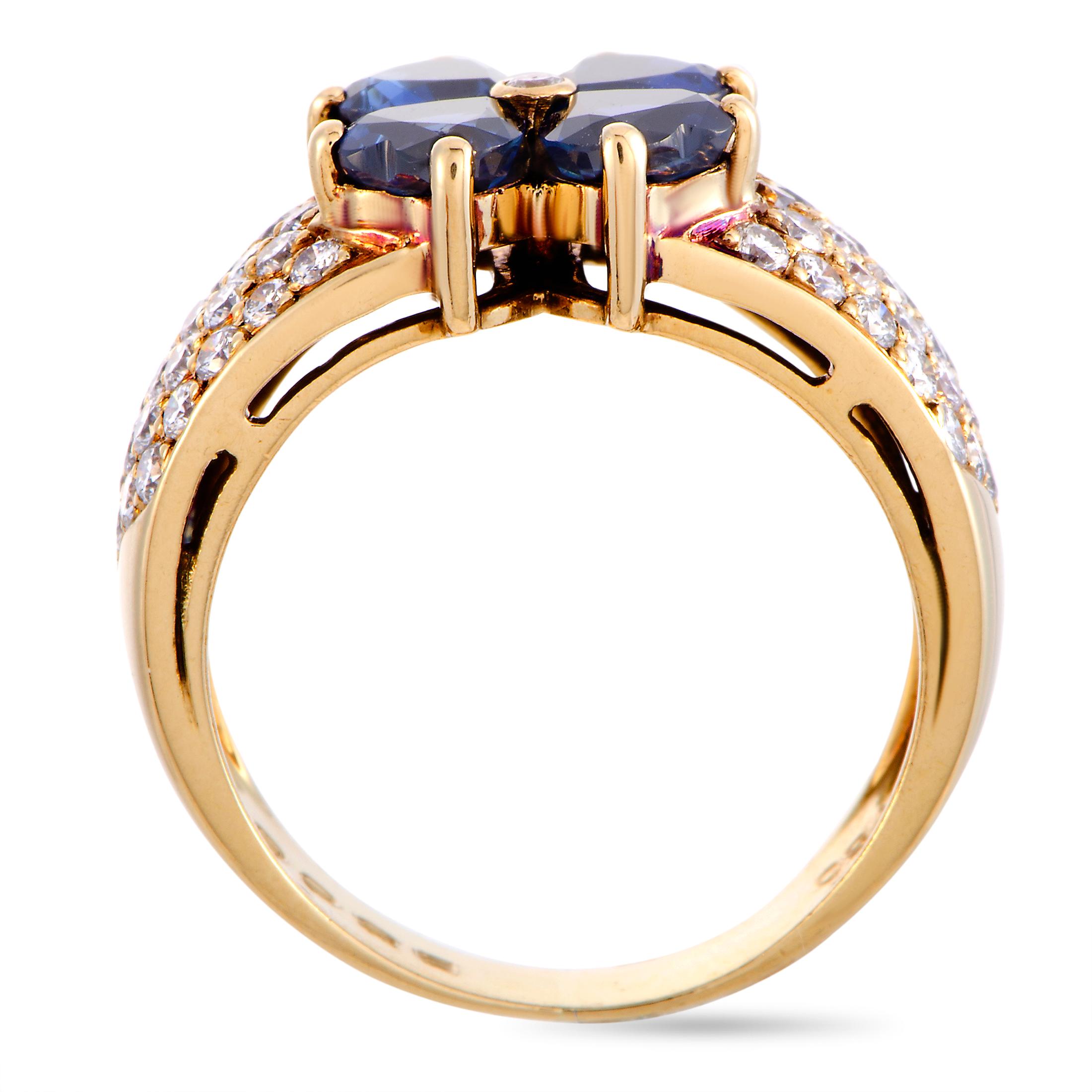 This Van Cleef & Arpels ring is made of 18K yellow gold and weighs 6 grams. It is set with a total of approximately 0.65 carats of diamonds and with four sapphires that weigh 1.00 carat in total. The ring boasts band thickness of 4 mm and top height