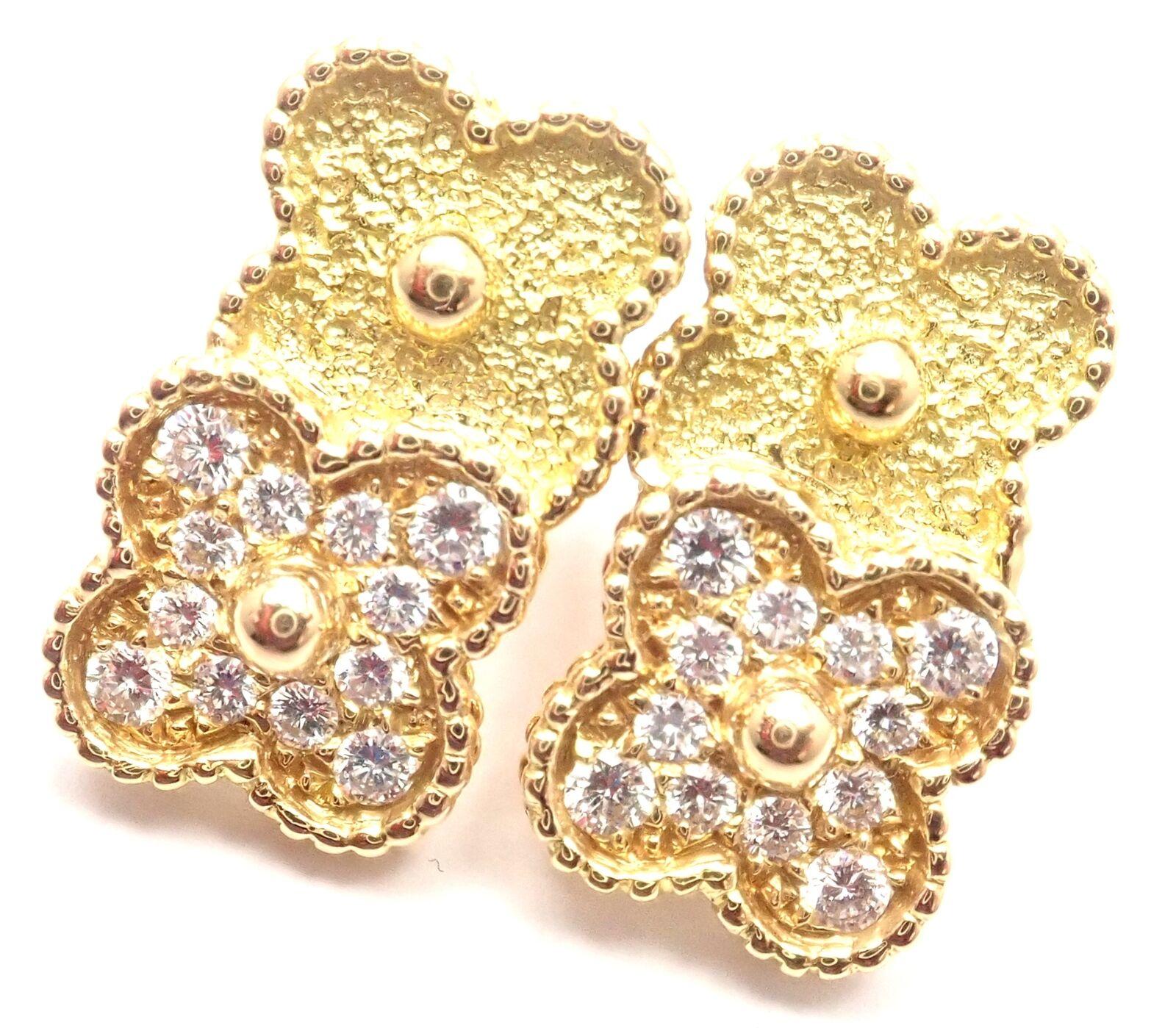 18k Yellow Gold And Diamond Vintage Alhambra Earrings
by Van Cleef & Arpels.
With 24 round brilliant cut diamond VVS1 clarity, E color total weight .92ct
These earrings are for non pierced ears.
These earrings come with Van Cleef & Arpels