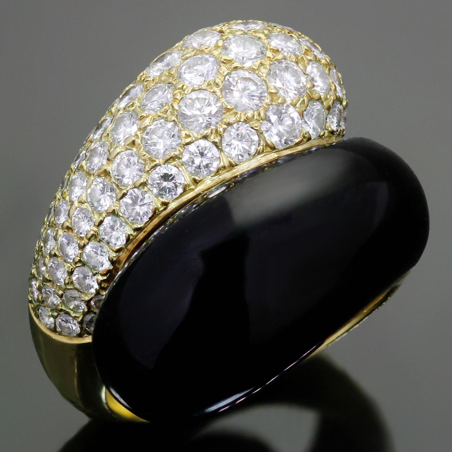 This magnificent Van Cleef & Arpels ring is crafted in 18k yellow gold and set with black onyx and about 87 brilliant-cut round D-F VVS1-VVS2 diamonds weighing an estimated 3.50 carats. Made in France circa 1980s. Measurements: 0.74
