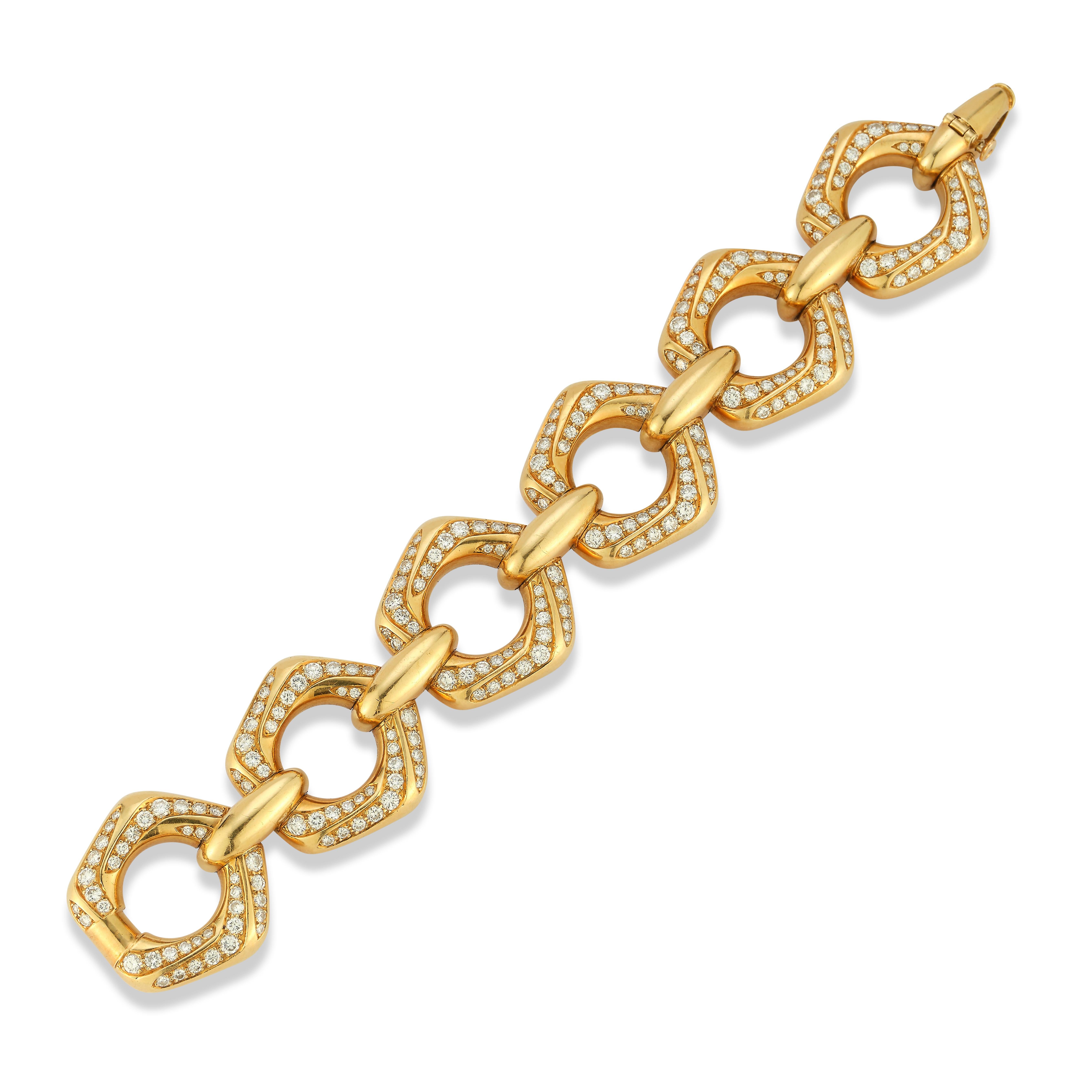 Van Cleef & Arpels Diamond Bracelet

An 18 karat gold bracelet set with 234 round diamonds weighing approximately 14 carats

Signed Van Cleef & Arpels and numbered
Stamped 750

Length 7