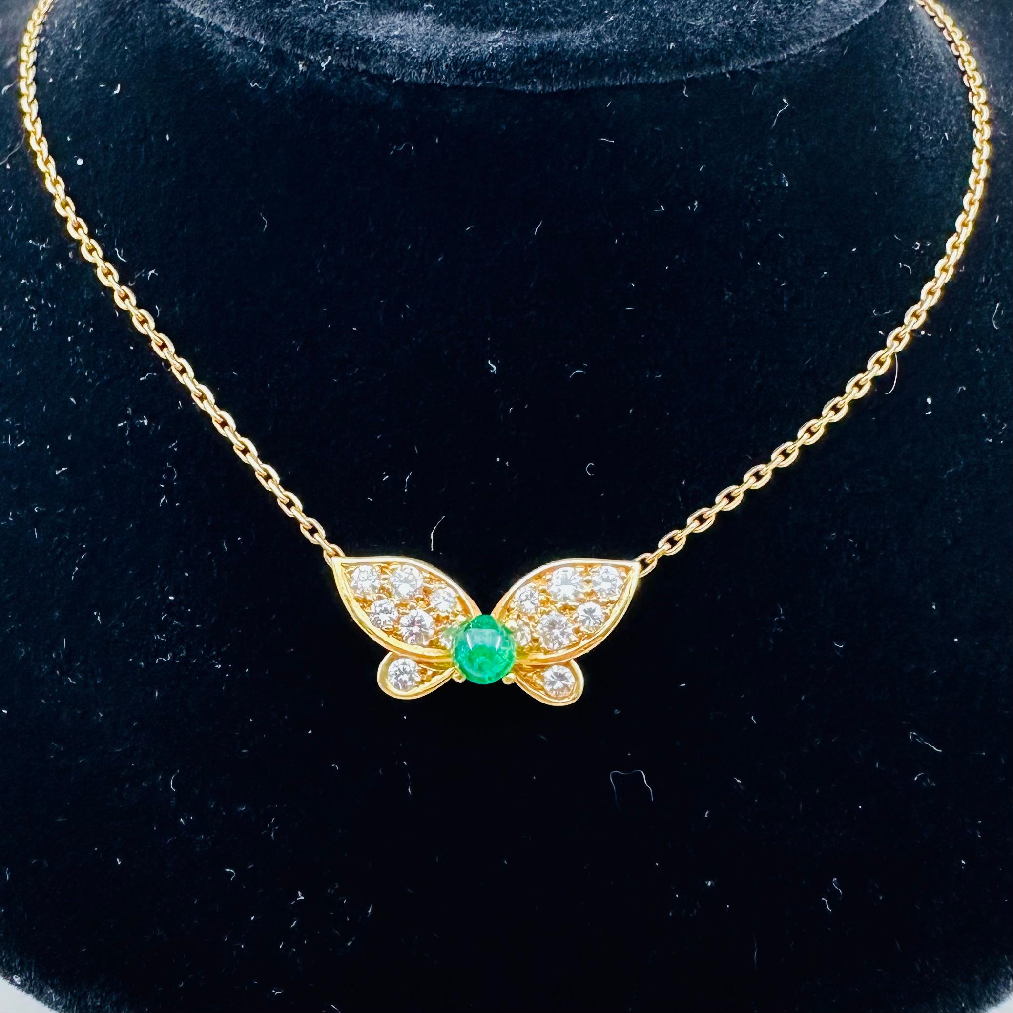Van Cleef & Arpels 
Green Emerald & Diamonds Butterfly Necklace
 One cabochon Green Emerald est. 0.50 ct and round brilliant-cut D-F VVS1-VVS2 diamonds weighing an estimated 0.50 carats. 
18K Yellow Gold chain has  an adjustable length from 15 to
