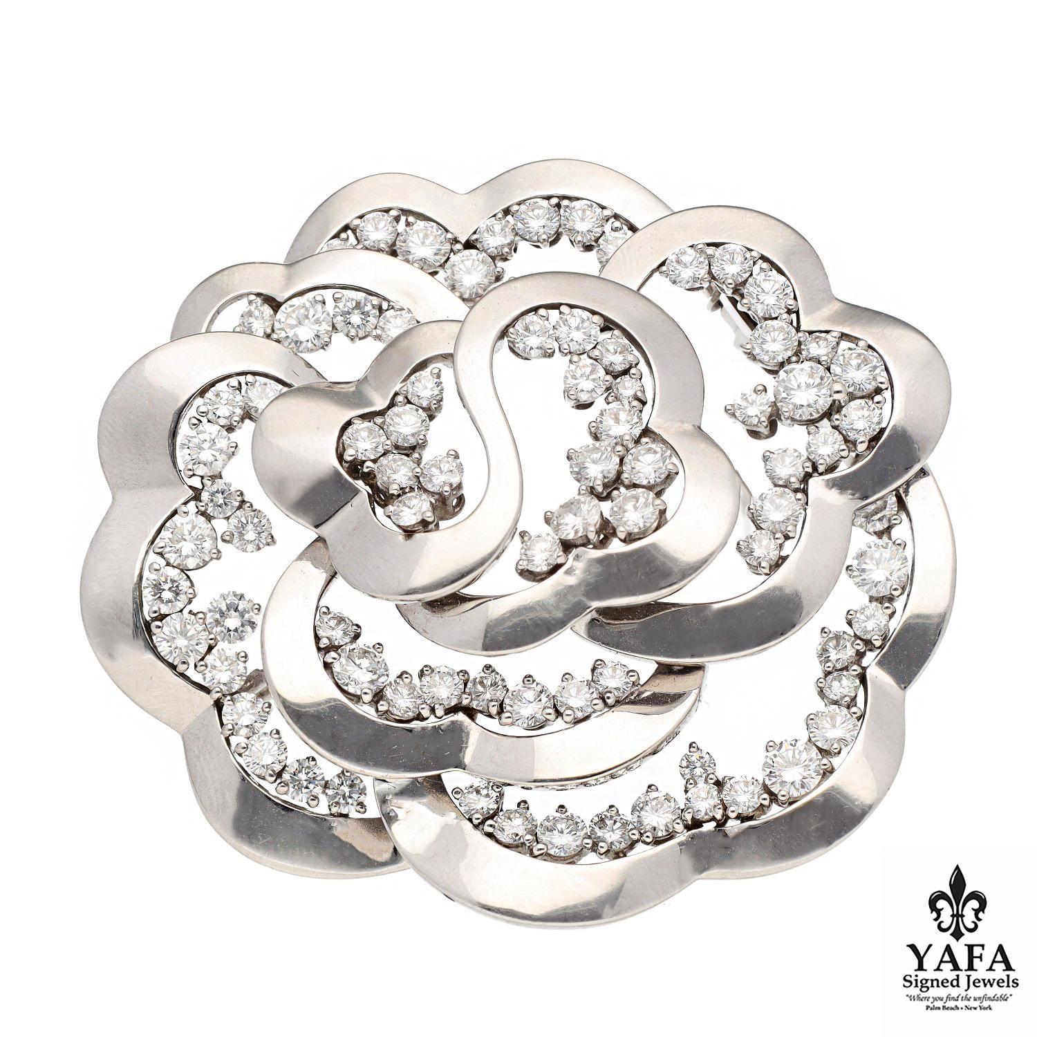 Dazzling Brilliance Radiates from Every Angle, Thanks to the Meticulously Pave-Set Diamonds Fashioned in an Open Three-Dimensional Design Capturing the Alluring Delicate Essence of Camellia in Bloom. 
Brooch Width - 2