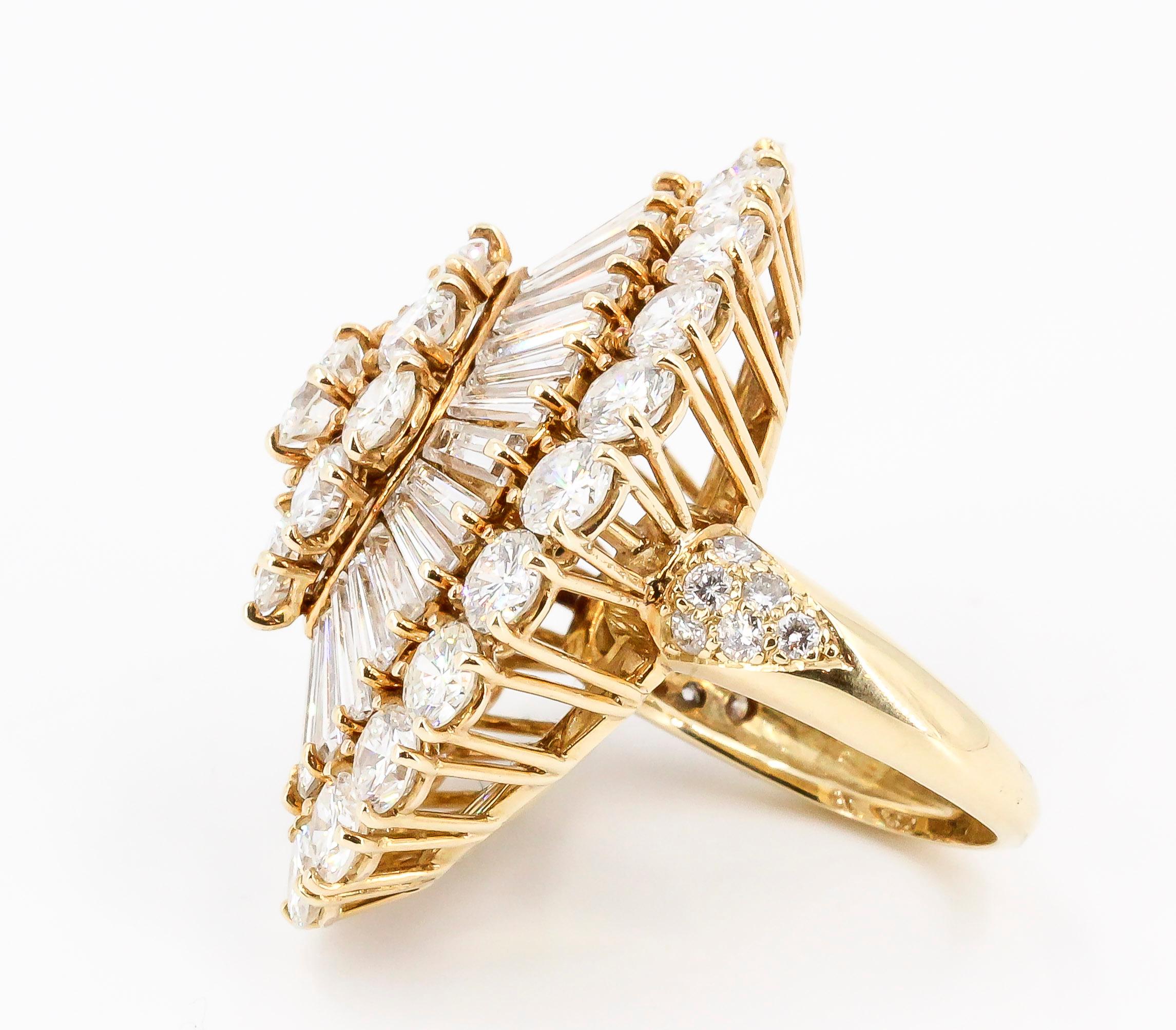 Very fine diamond and 18K yellow gold dome ring by Van Cleef & Arpels. This style of ring is commonly known as the Ballerina ring, because of its mixed cut design; it features high grade round and tapered baguette cut diamonds, approx. 10.0-11.0cts