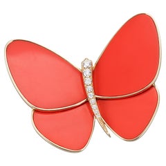 Van Cleef & Arpels Spilla a farfalla in oro 18k con diamanti e corallo
