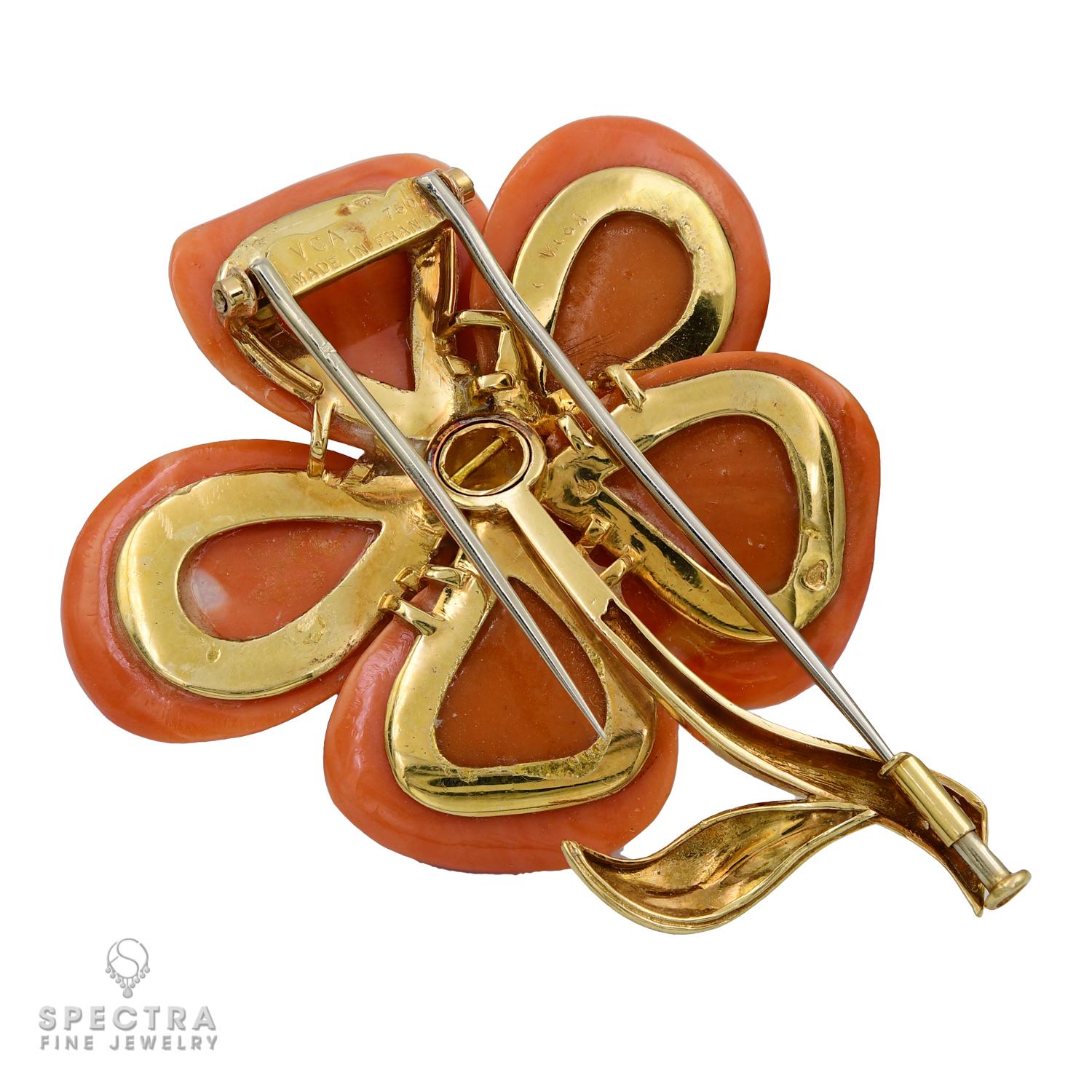 One of the more notable features of the Clematis Brooch by Van Cleef & Arpels are the five petals, sometimes heart shaped and outlined in gold, sometimes made of dark highly polished wood or mother of pearl, or freely depicted in coral that ranges