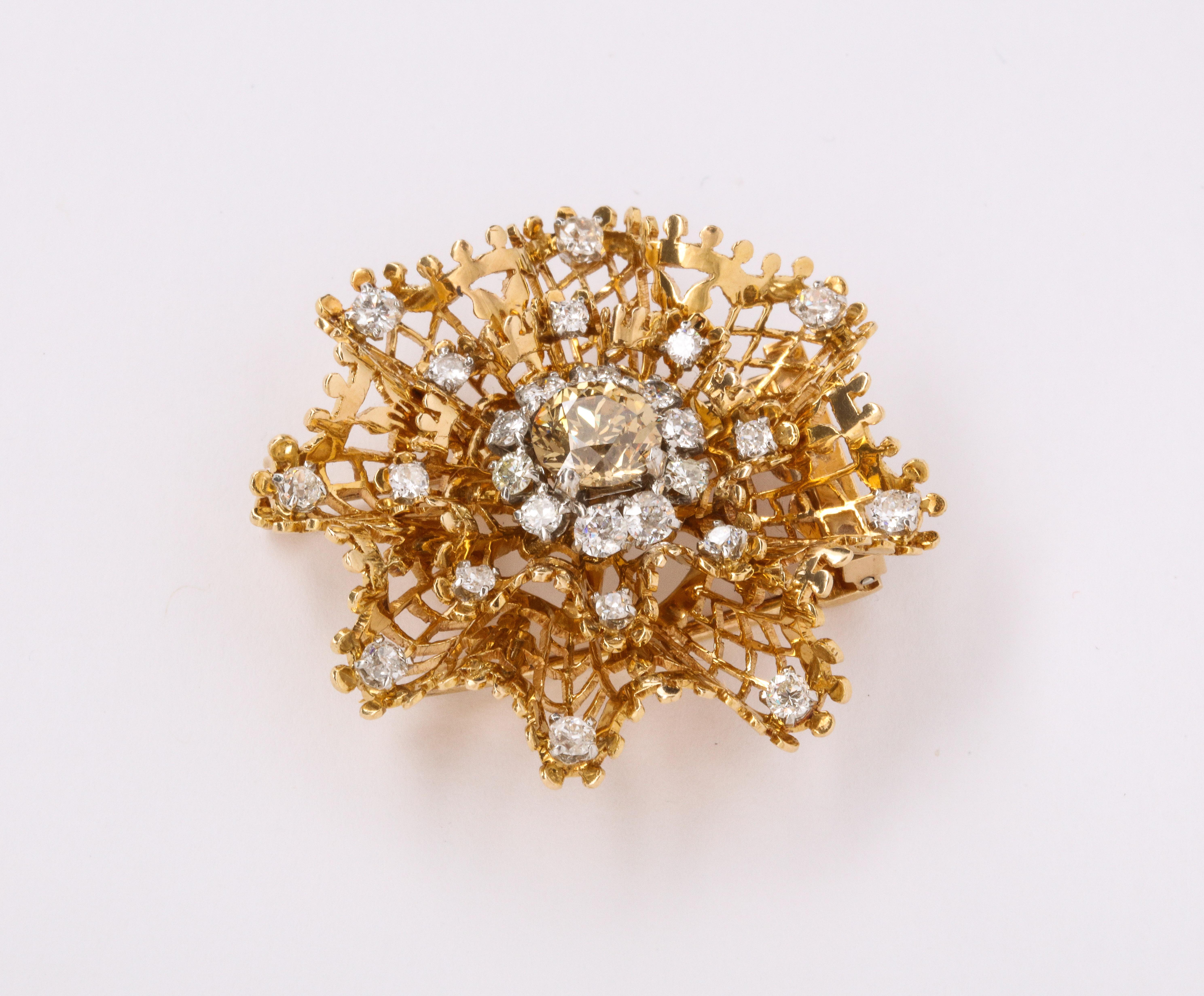 Van Cleef & Arpels Diamond Dentelle Flower Brooch, 18K Yellow Gold Circa 1950
Center Diamond Weight:  approx 1.15 Cts
Side Diamond Weight: approx 1.75 Cts
Measurements: 1.25