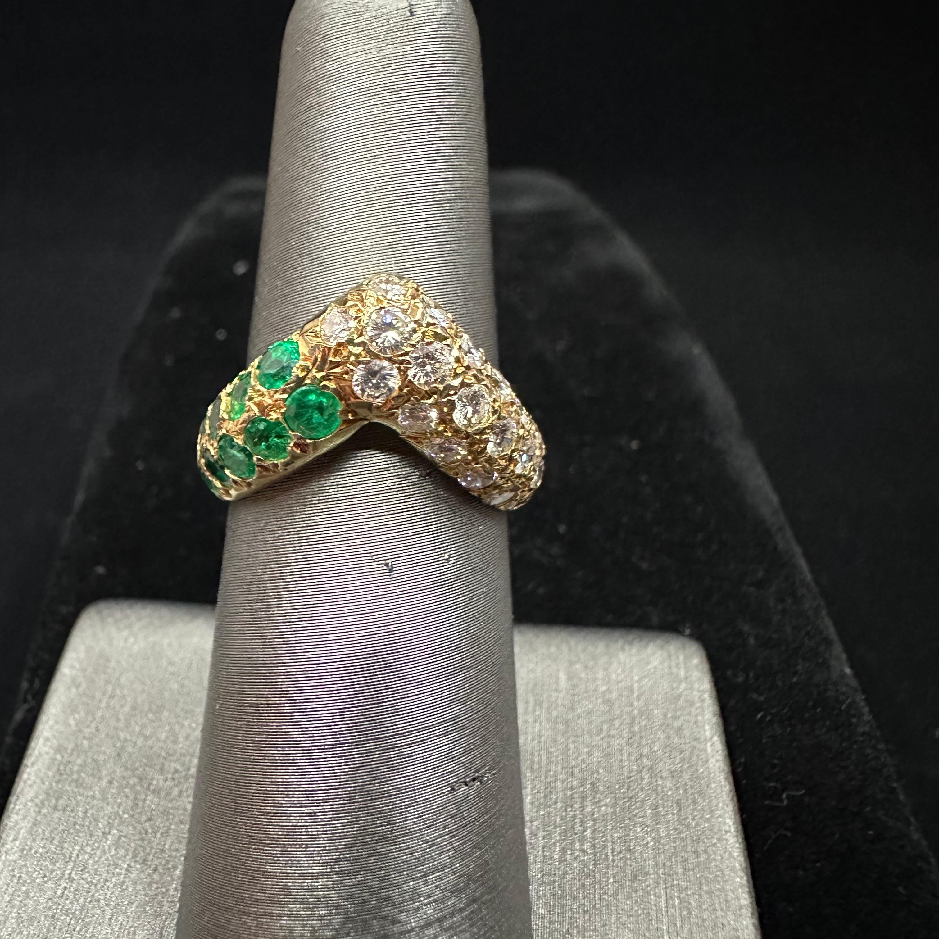 VCA Emerald & Diamond Asymmetrical Stacking Ring.
Pave Set Round Brilliant Diamonds and Emeralds
TW  1.55 cts
18k Yellow Gold 
Size 5.5
Produced in several variations of stacking rings from 1970's 
Made in France Hallmarkes and workshop stamps. 
