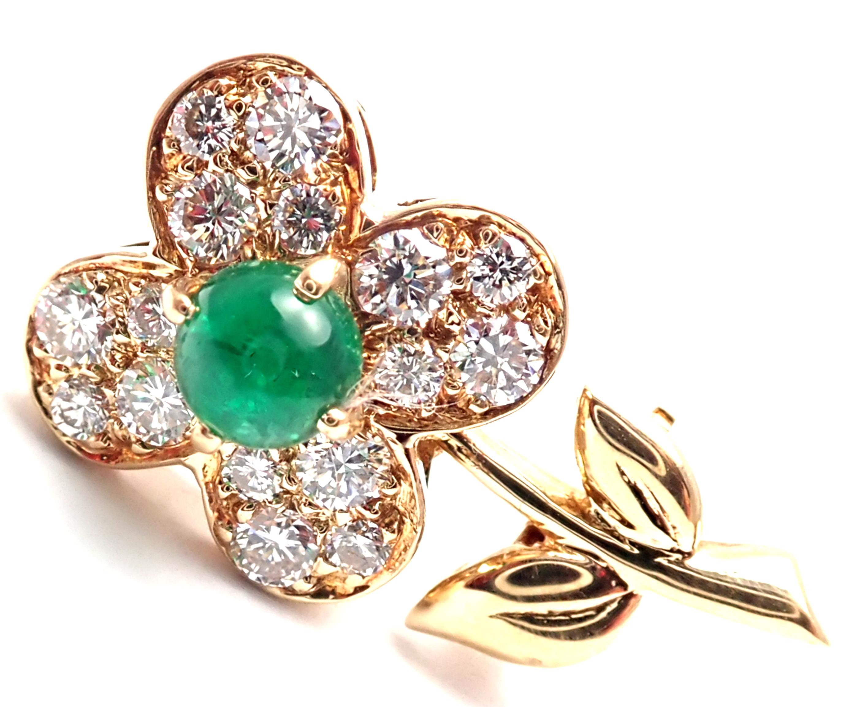 18k Yellow Gold Flower Diamond Emerald Brooch Pin by Van Cleef & Arpels. 
With 16 diamond VVS1 clarity, G color total weight .33ct
1 cabochon emerald 4.5mm
Details: 
Measurements: 20mm x 10mm
Weight: 3.3 grams
Stamped Hallmarks: VCA 750 B(*serial