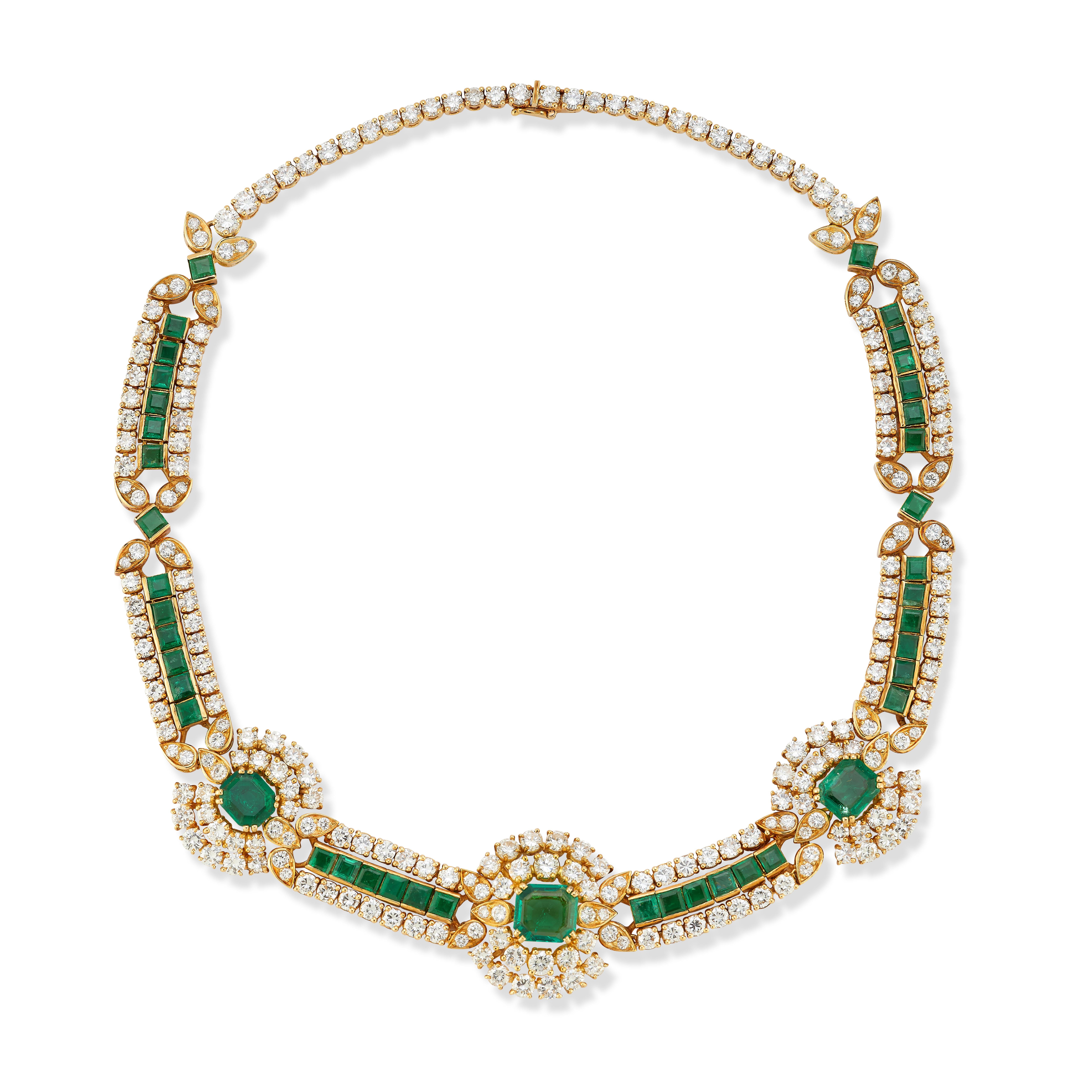 Van Cleef & Arpels Diamond & Emerald Necklace

Featuring three rows adorned with round-cut diamonds and square-cut emeralds. 

Signed: Van Cleef & Arpels and numbered, French maker's mark
Stamped: Made in France

Length: 15