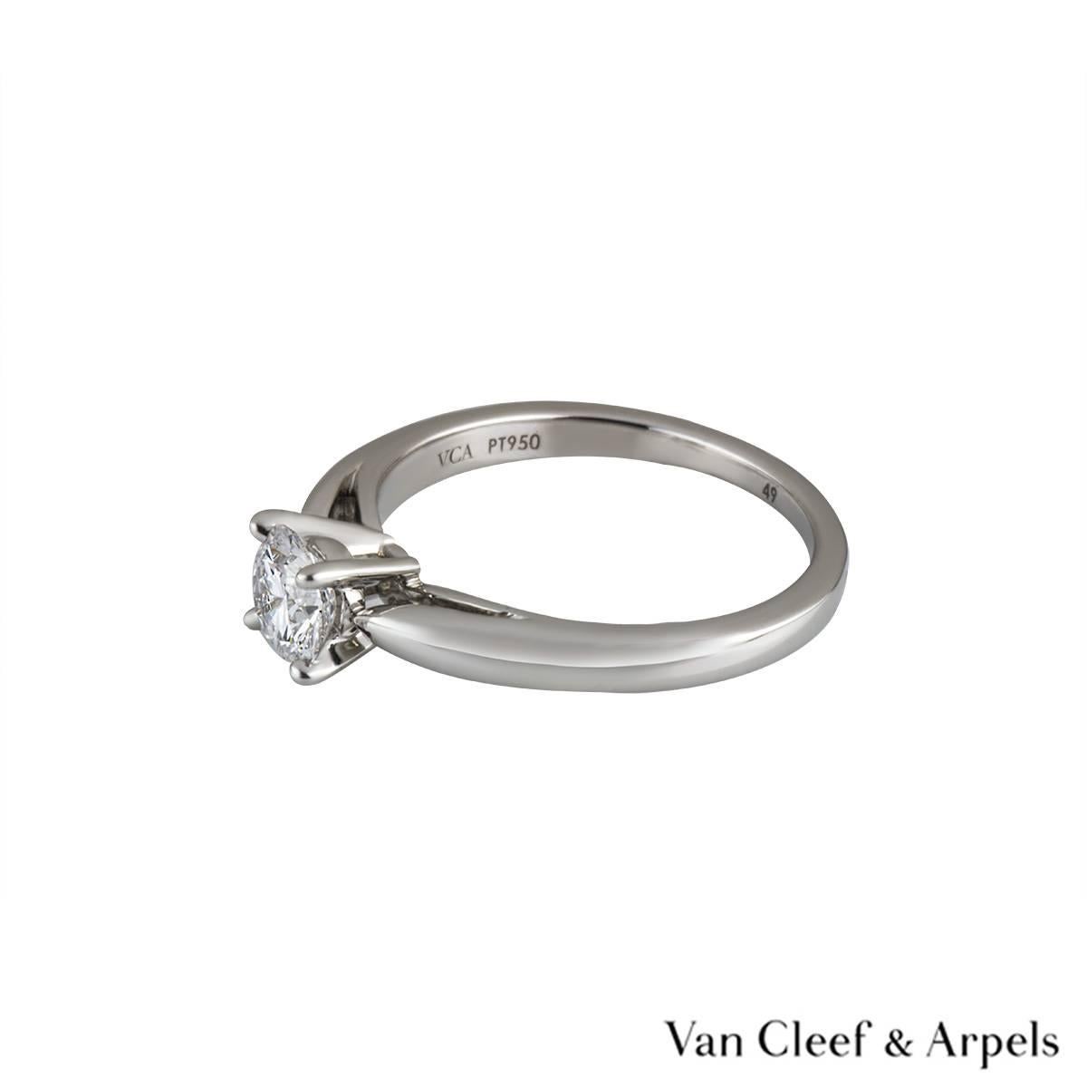 A beautiful diamond single stone ring by Van Cleef & Arpels. The ring is set to the centre with a round brilliant cut diamond weighing 0.50ct, D in colour and VVS2 in clarity in a traditional four claw setting. The diamond scores an excellent rating