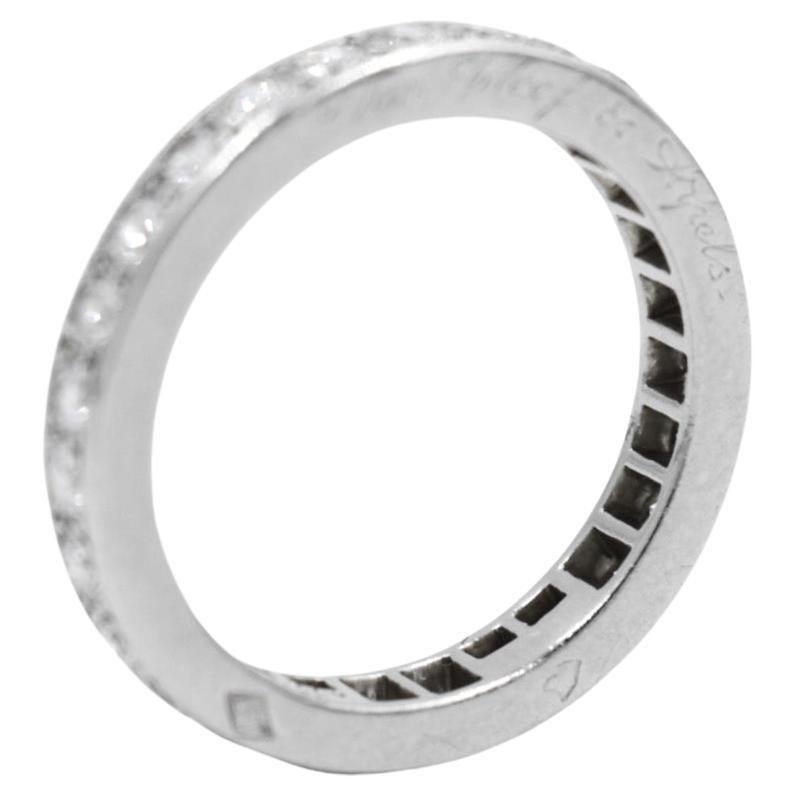 The Van Cleef & Arpels brillant cut eternity band in platinum is a remarkable piece of jewelry that represents timeless elegance and sophistication. 

The band is in excellent condition, adding to its allure and value. Crafted from high-quality