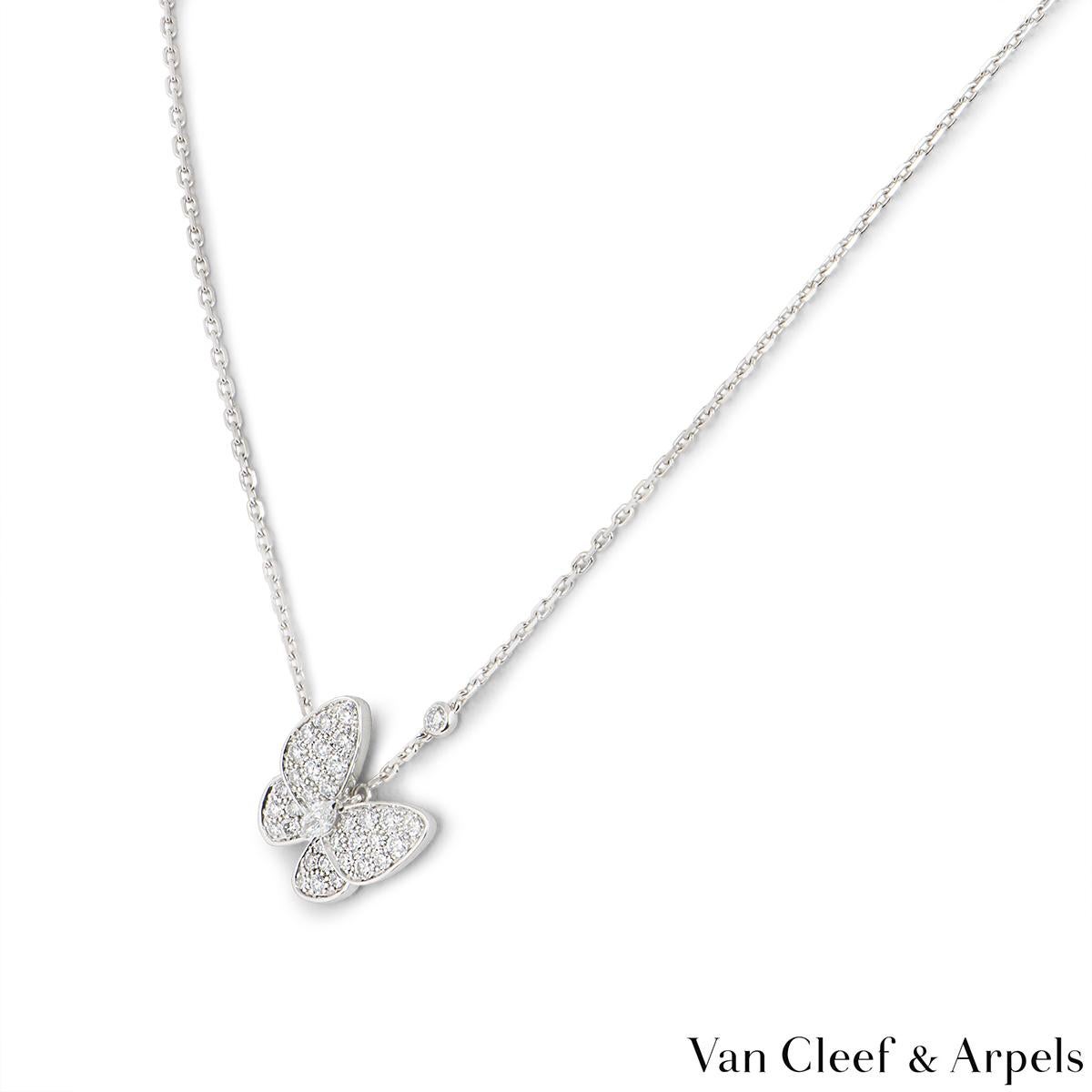 A beautiful 18k white gold pendant from the Fauna Two Butterfly collection by Van Cleef & Arpels. The pendant features a Butterfly motif with 34 pave set round brilliant cut diamonds and a single marquise cut diamond in the centre. There is also a