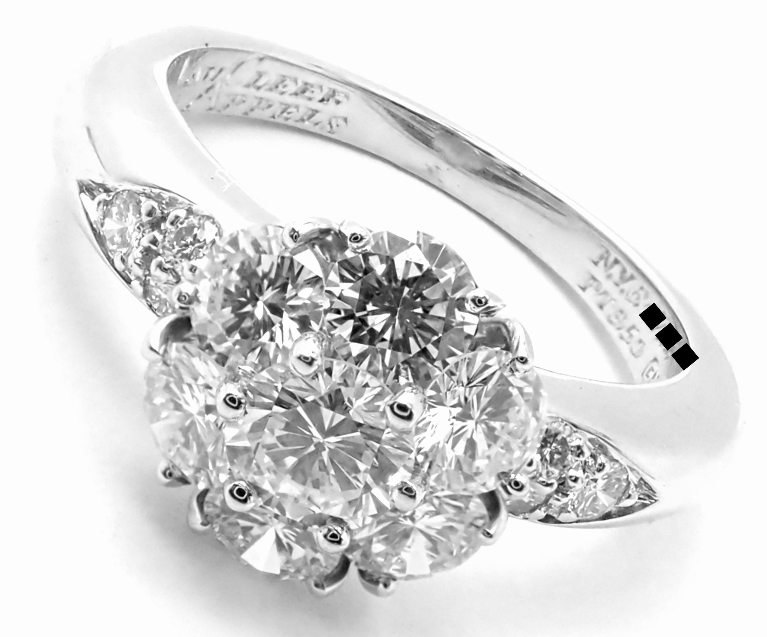Platinum Diamond Fleurette Flower Ring by Van Cleef & Arpels. 
With 13 Round brilliant cut diamonds total weight approximately 1.13ct E/VVS1
Details:
Size 5
Width: 9.5mm
Weight: 7 grams
Stamped Hallmarks: Van Cleef & Arpels PT950 N.Y.6XXXX(serial