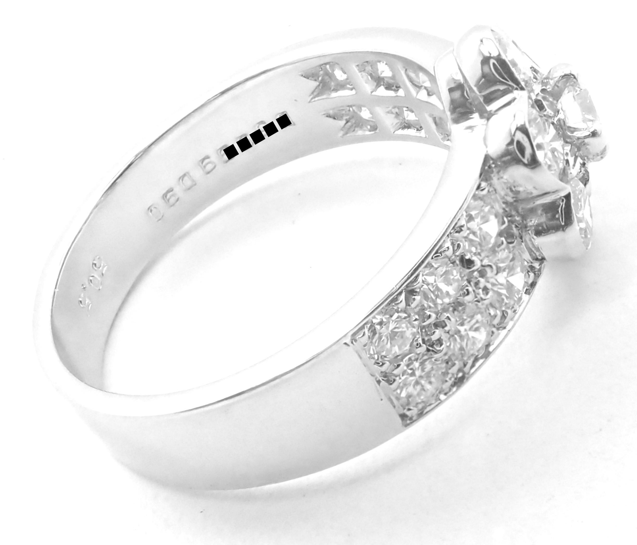 Platinum Diamond Diamond Fleurette Flower Ring by Van Cleef & Arpels. 
With 19 Round brilliant cut diamonds total weight approximately 1.05ct E/VVS1
Details:
Size:  European 50.5  US 5.5
Width: 9.5mm
Weight: 5.7 grams
Stamped Hallmarks: Van Cleef &