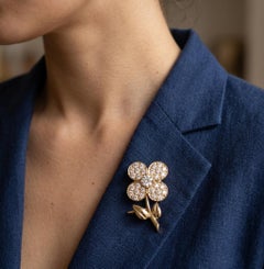 Van Cleef & Arpels Spilla a fiore con diamante in oro giallo 18 carati