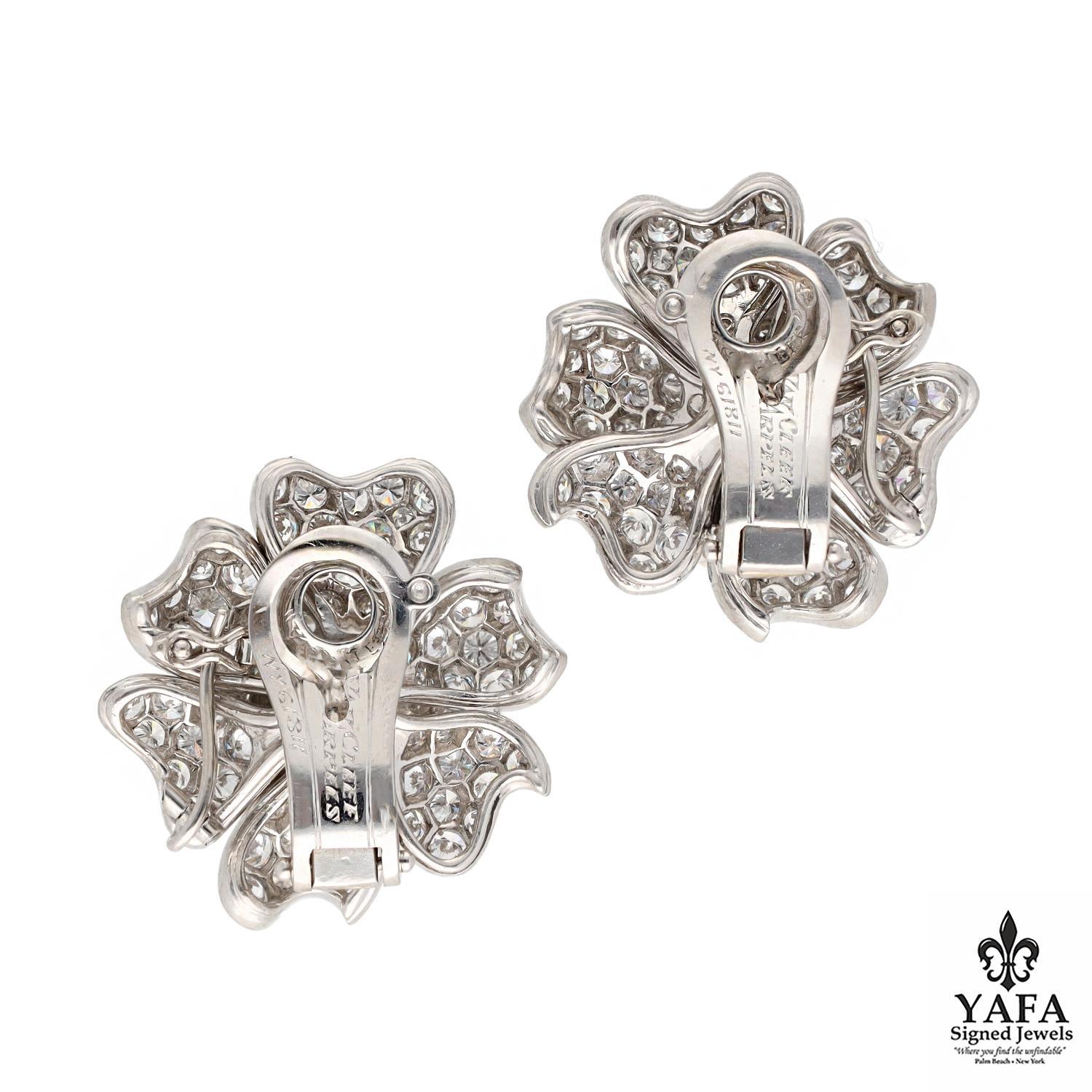 Signature flower motif earrings from Van Cleef & Arpels crafted in platinum and radiant with pave diamonds.

Approximate Length - 1