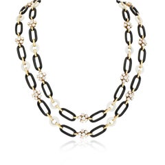 VAN CLEEF & ARPELS Diamond Flower, Onyx and White Coral Link Necklace