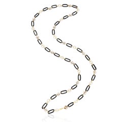 VAN CLEEF & ARPELS Diamond Flower, Onyx and White Coral Link Necklace