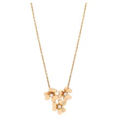 Van Cleef & Arpels Collier pendentif Frivole à 3 fleurs en or jaune 18 carats et diamants