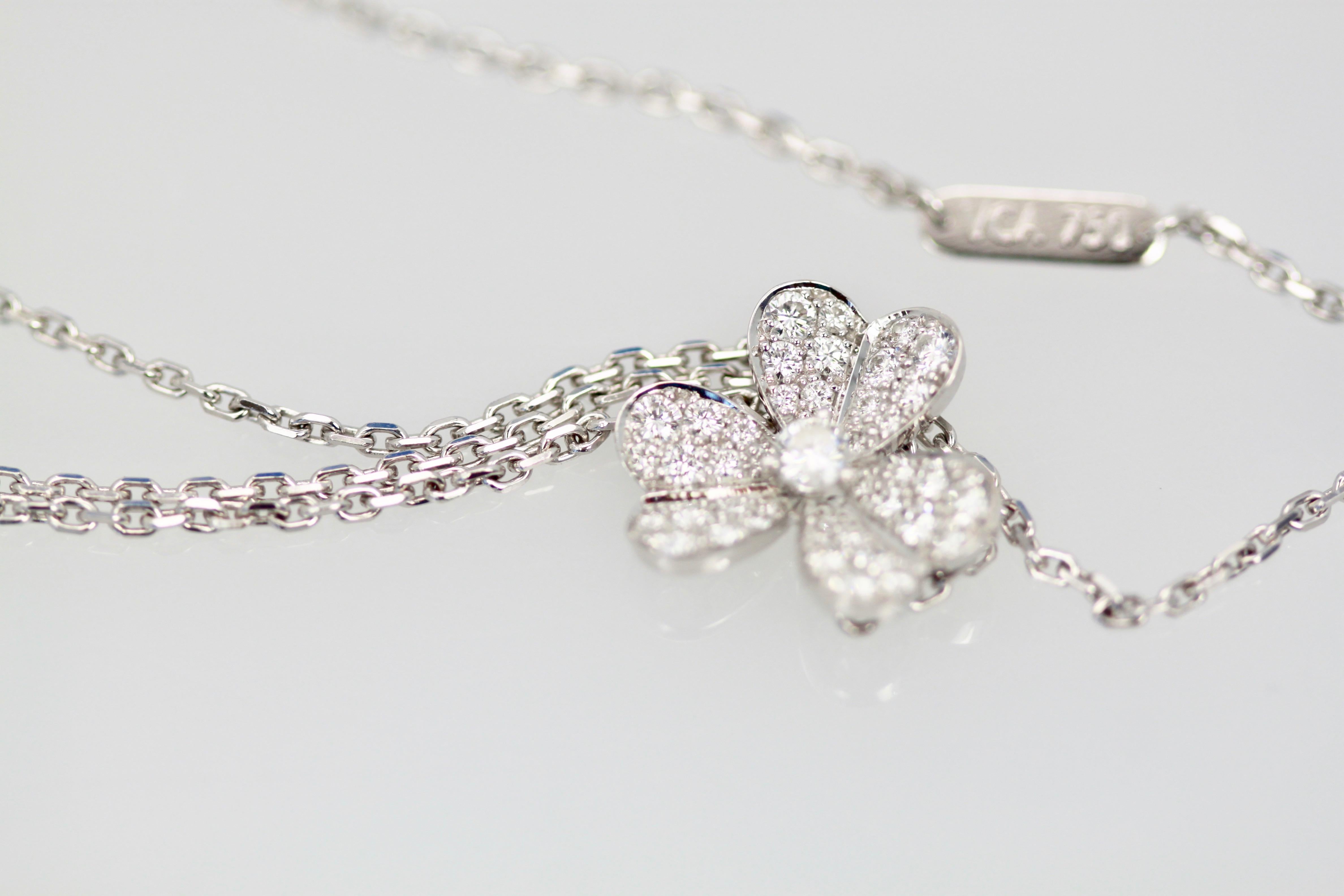 This gorgeous Frivole Pendant is the small version and it sparkles.  This Frivole design is like petals in the wind and it is signed and numbered and comes with its original VCA box.
Sorry no certificate.  This is 18K Gold and weighs 5.81 grams and