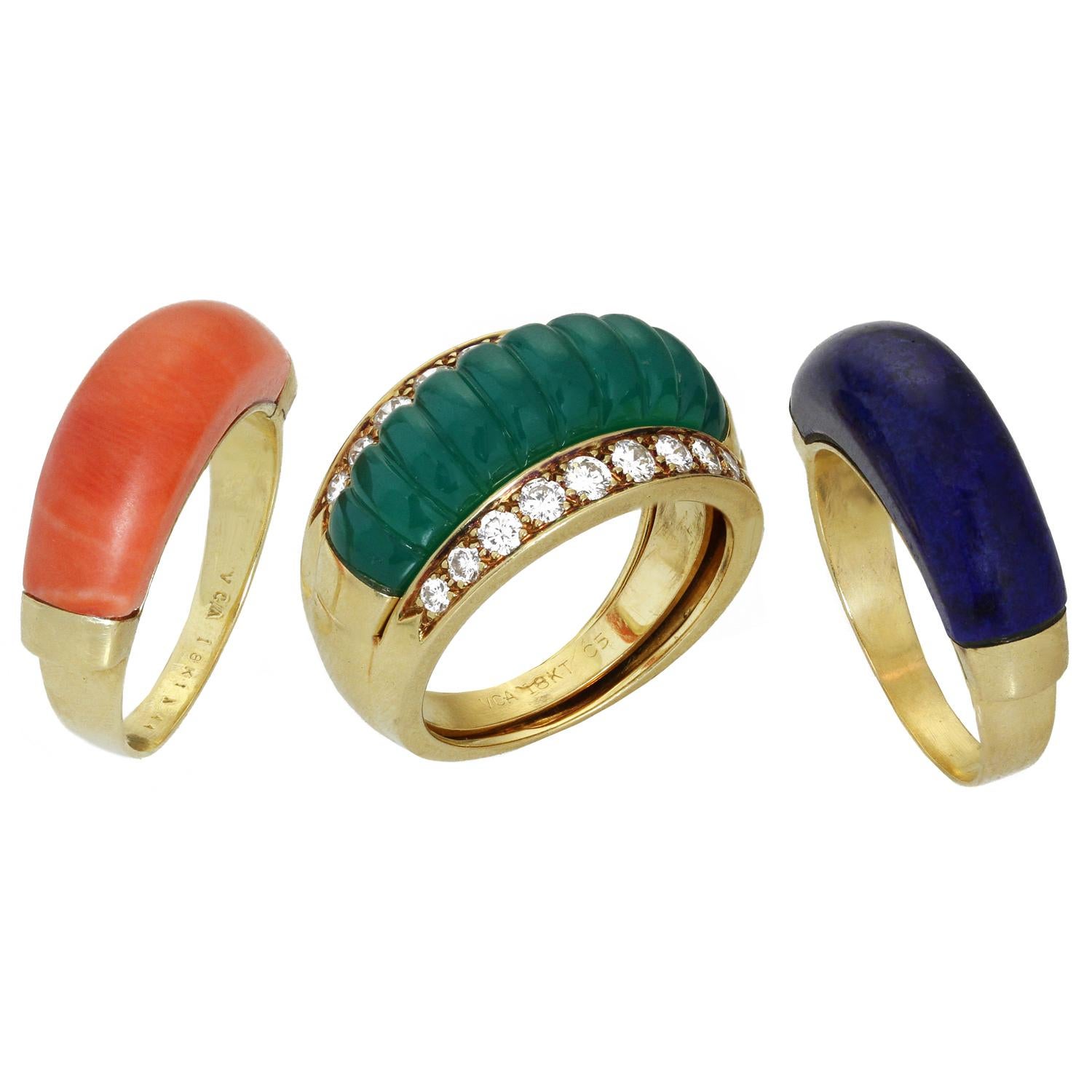 This gorgeous and rare Van Cleef & Arpels interchangeable ring set features carved green chalcedony, lapis lazuli, and coral gemstones set in 18k yellow gold and accented with brilliant-cut round diamonds that adorn the framing ring. Made in France